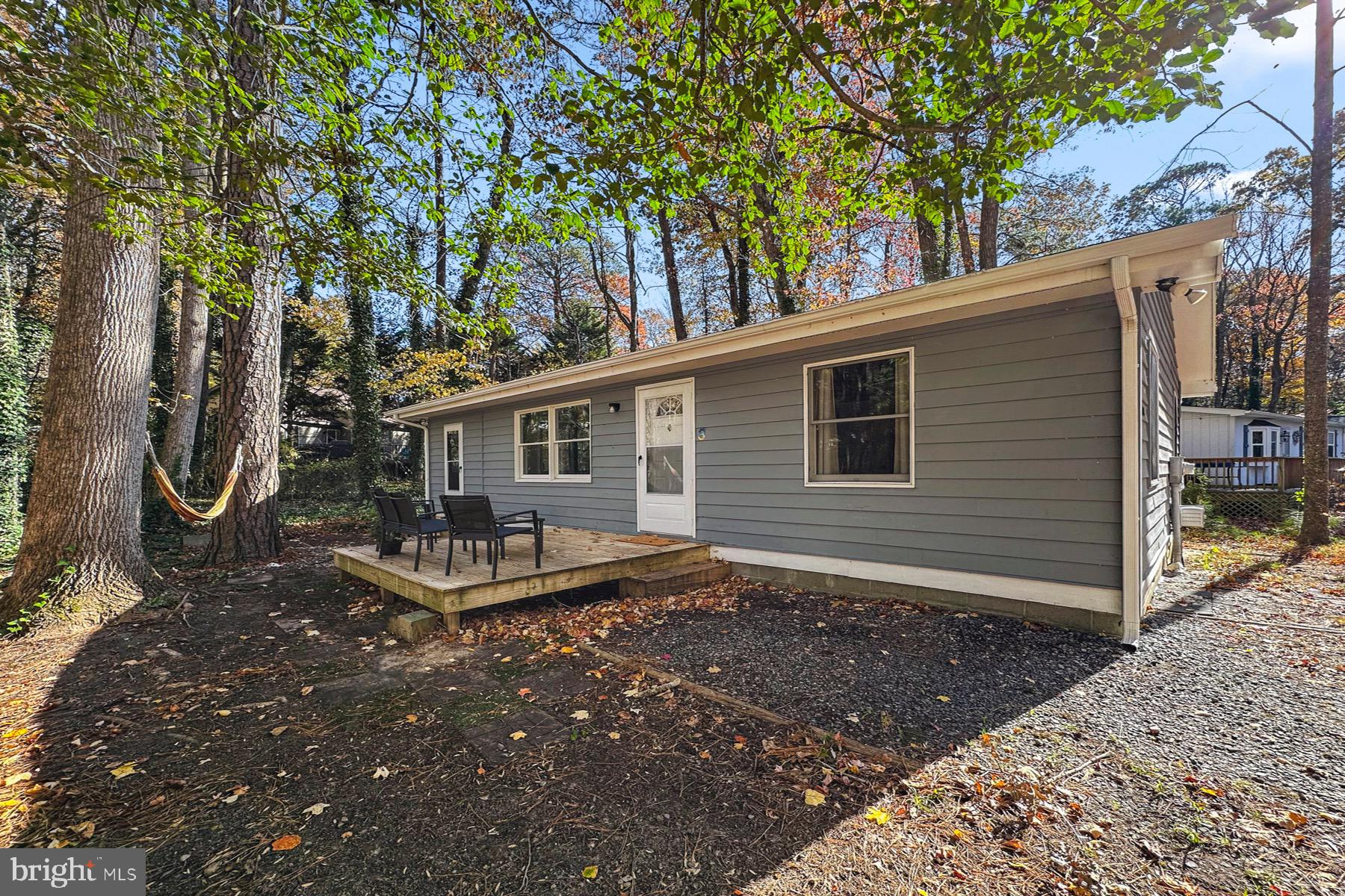 3 Birdnest Drive Ocean Pines, MD 21811 - Photo 26 of 29 a backyard of a house with barbeque oven tree and outdoor seating