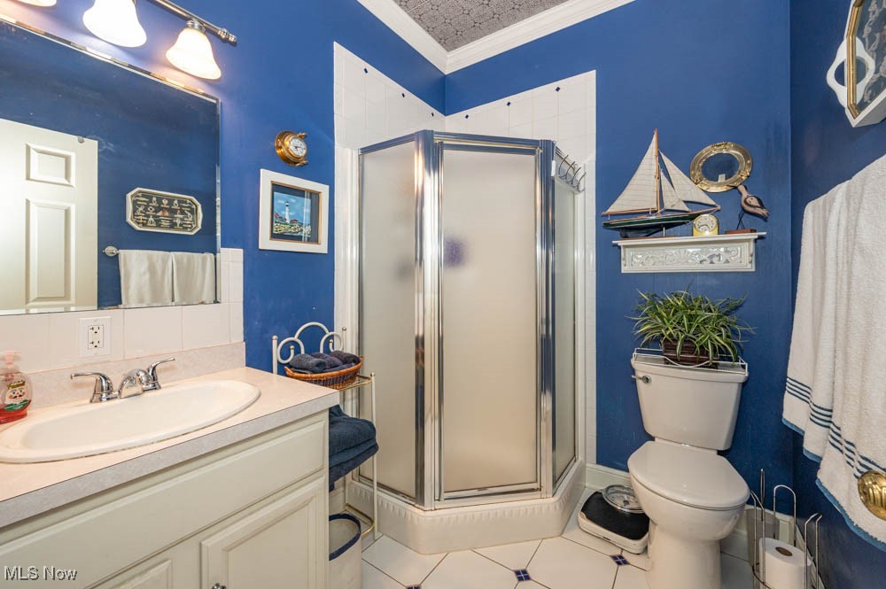 124 Wilcox Road Youngstown, OH 44515 - Photo 27 of 38 The FB in the 2nd Bdrm features Walk-in Shower and Ceramic Tile Floor.
