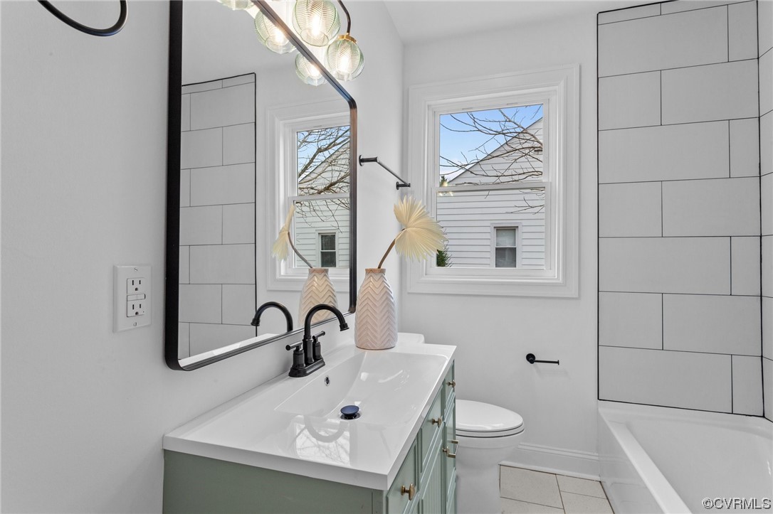 2217 Bailey Drive Henrico, VA 23231 - Photo 13 of 25 a bathroom with a sink a toilet and a mirror