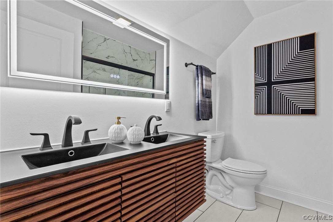 2217 Bailey Drive Henrico, VA 23231 - Photo 19 of 25 a bathroom with a sink a toilet and mirror