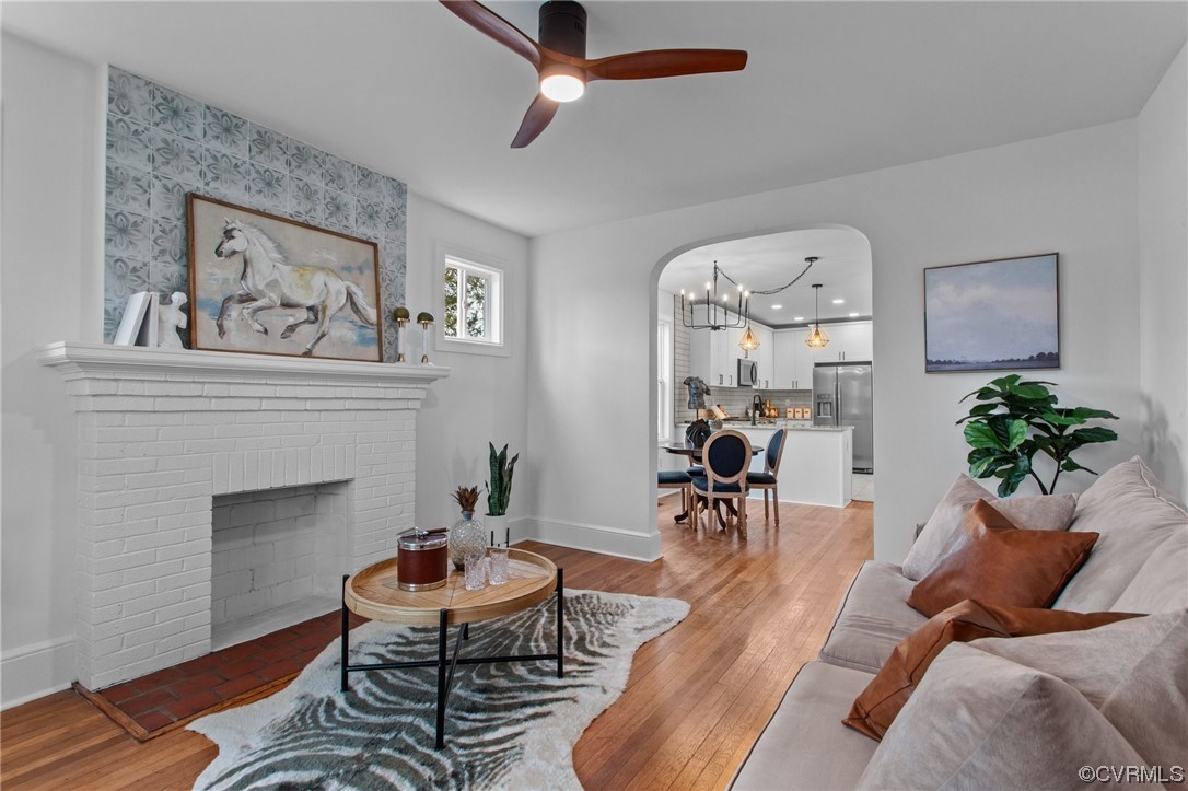 2217 Bailey Drive Henrico, VA 23231 - Photo 3 of 25 a living room with furniture chandelier and a fireplace