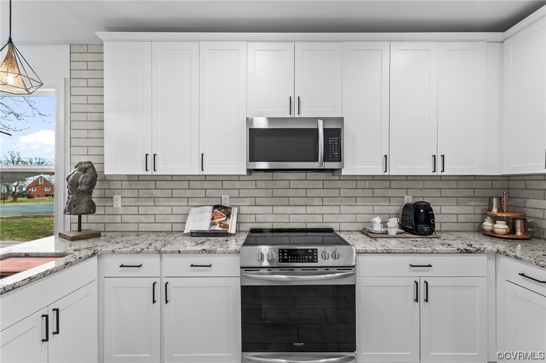 2217 Bailey Drive Henrico, VA 23231 - Photo 7 of 25 a kitchen with appliances a sink and cabinets