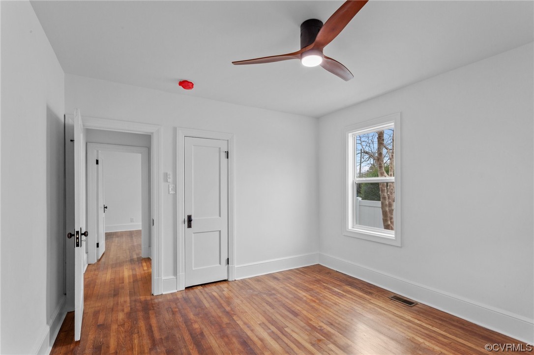 2217 Bailey Drive Henrico, VA 23231 - Photo 10 of 25 wooden floor in an empty room with a window