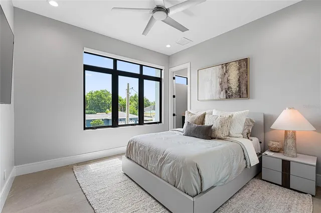 a bed room with a bed and a couch