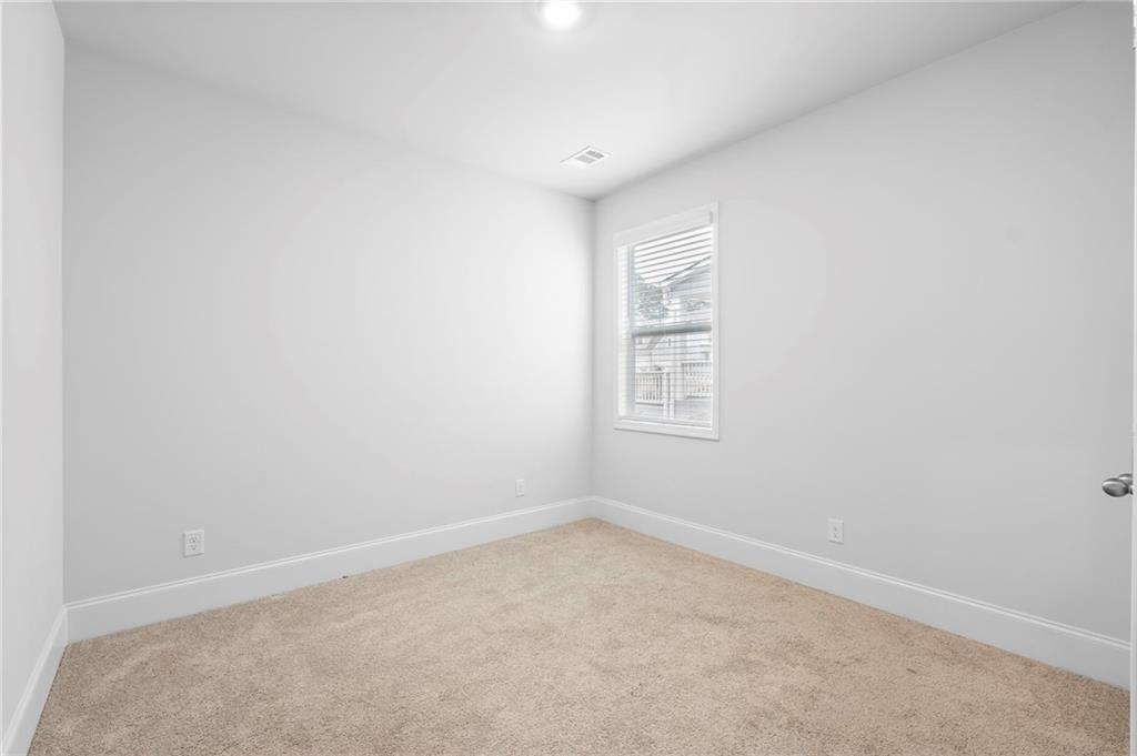 42 Citrine Way Acworth, GA 30101 - Photo 20 of 55 an empty room with a window