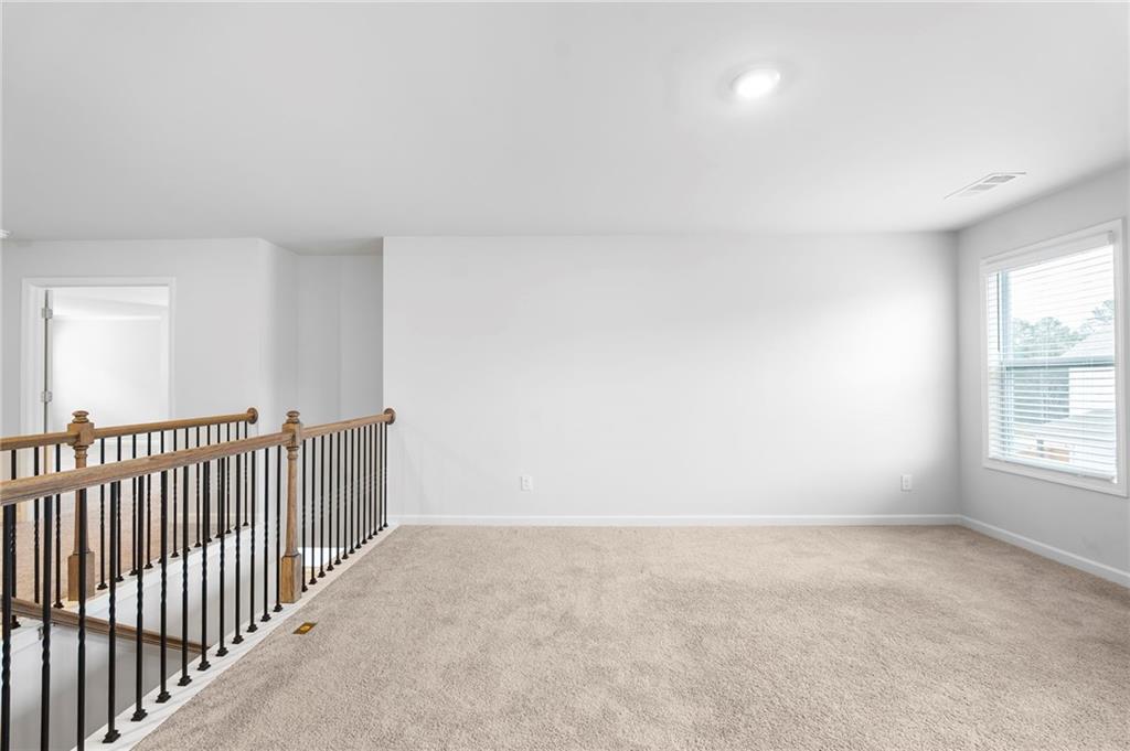 42 Citrine Way Acworth, GA 30101 - Photo 25 of 55 an empty room with windows