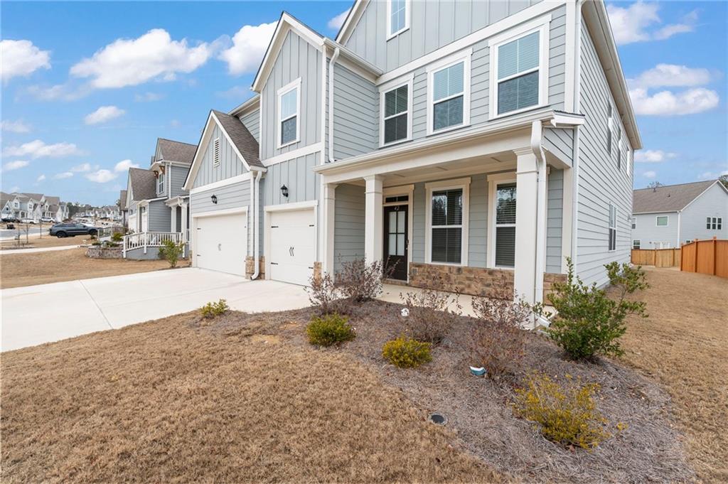 42 Citrine Way Acworth, GA 30101 - Photo 3 of 55 a front view of a house with a yard
