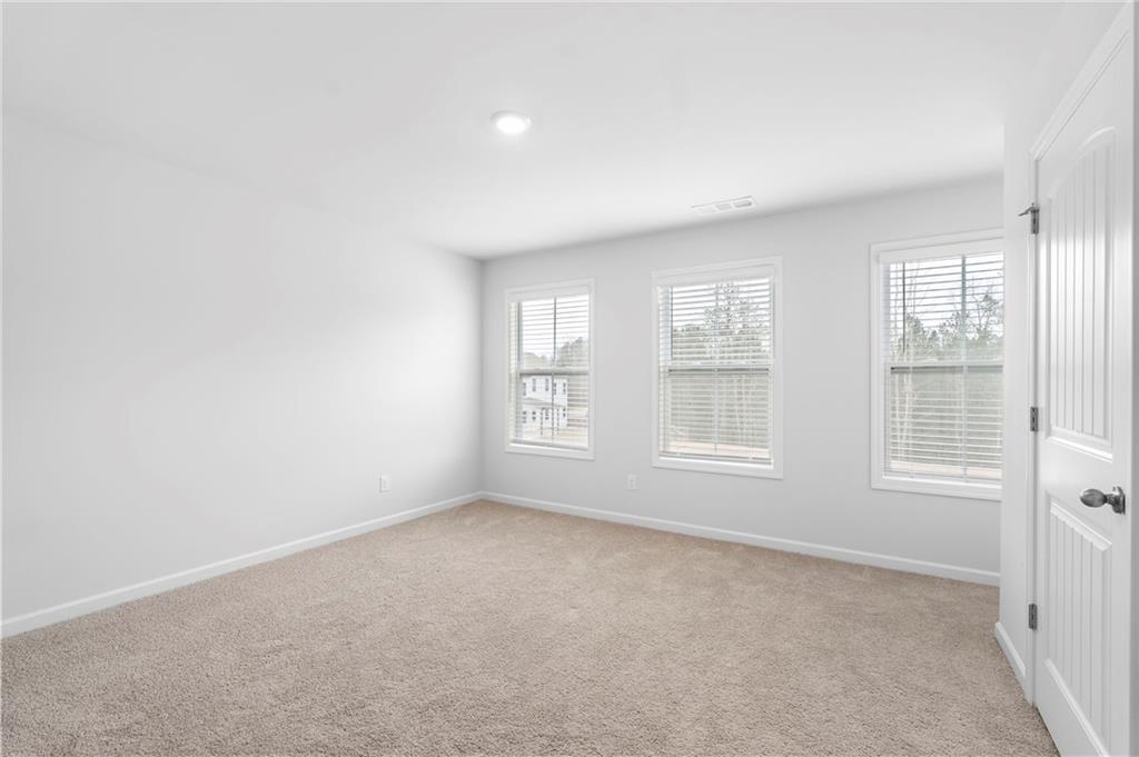 42 Citrine Way Acworth, GA 30101 - Photo 36 of 55 an empty room with a window