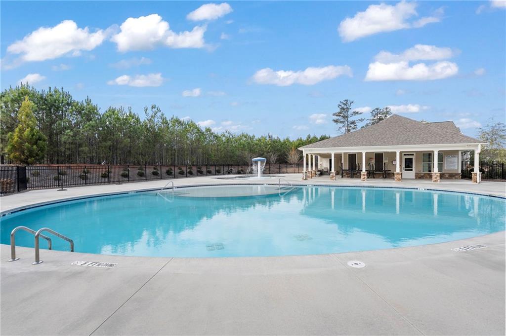 42 Citrine Way Acworth, GA 30101 - Photo 54 of 55 a view of a swimming pool with a yard