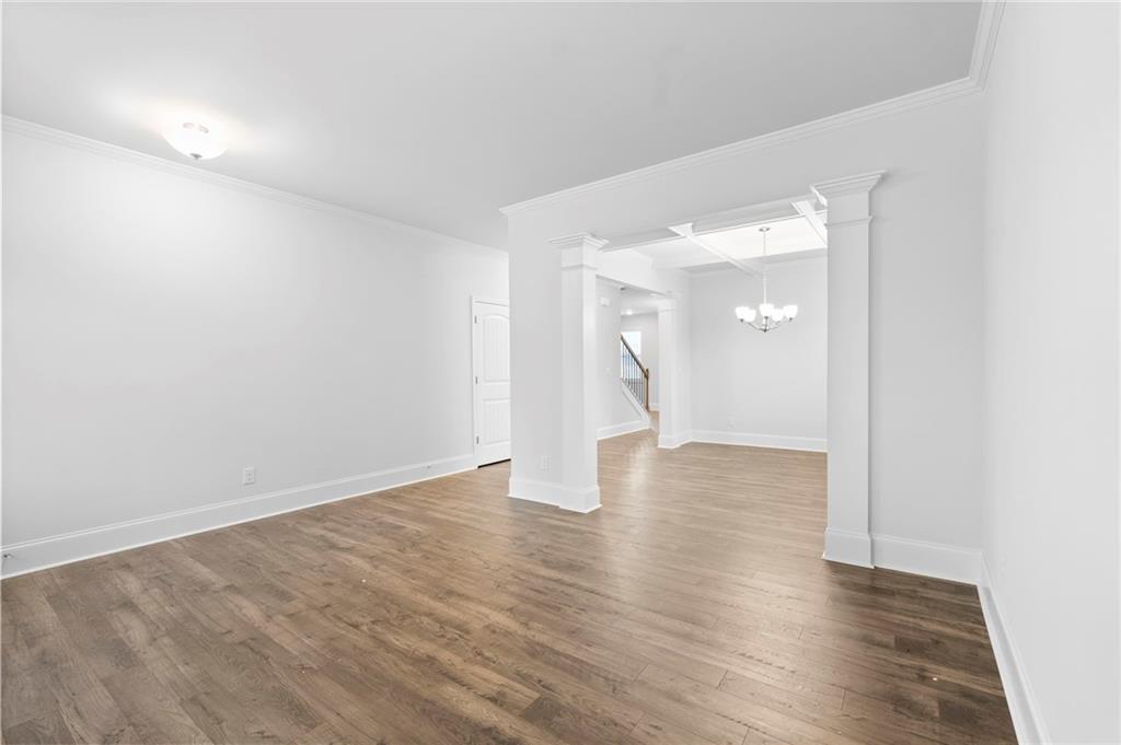 42 Citrine Way Acworth, GA 30101 - Photo 6 of 55 a view of an empty room with wooden floor