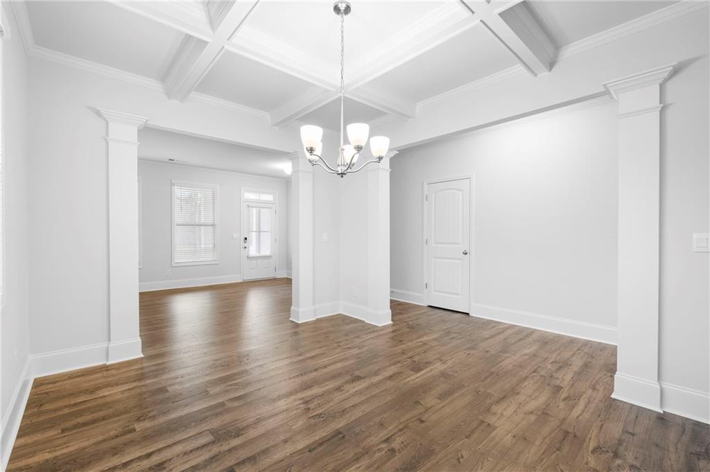 42 Citrine Way Acworth, GA 30101 - Photo 7 of 55 an empty room with wooden floor and windows