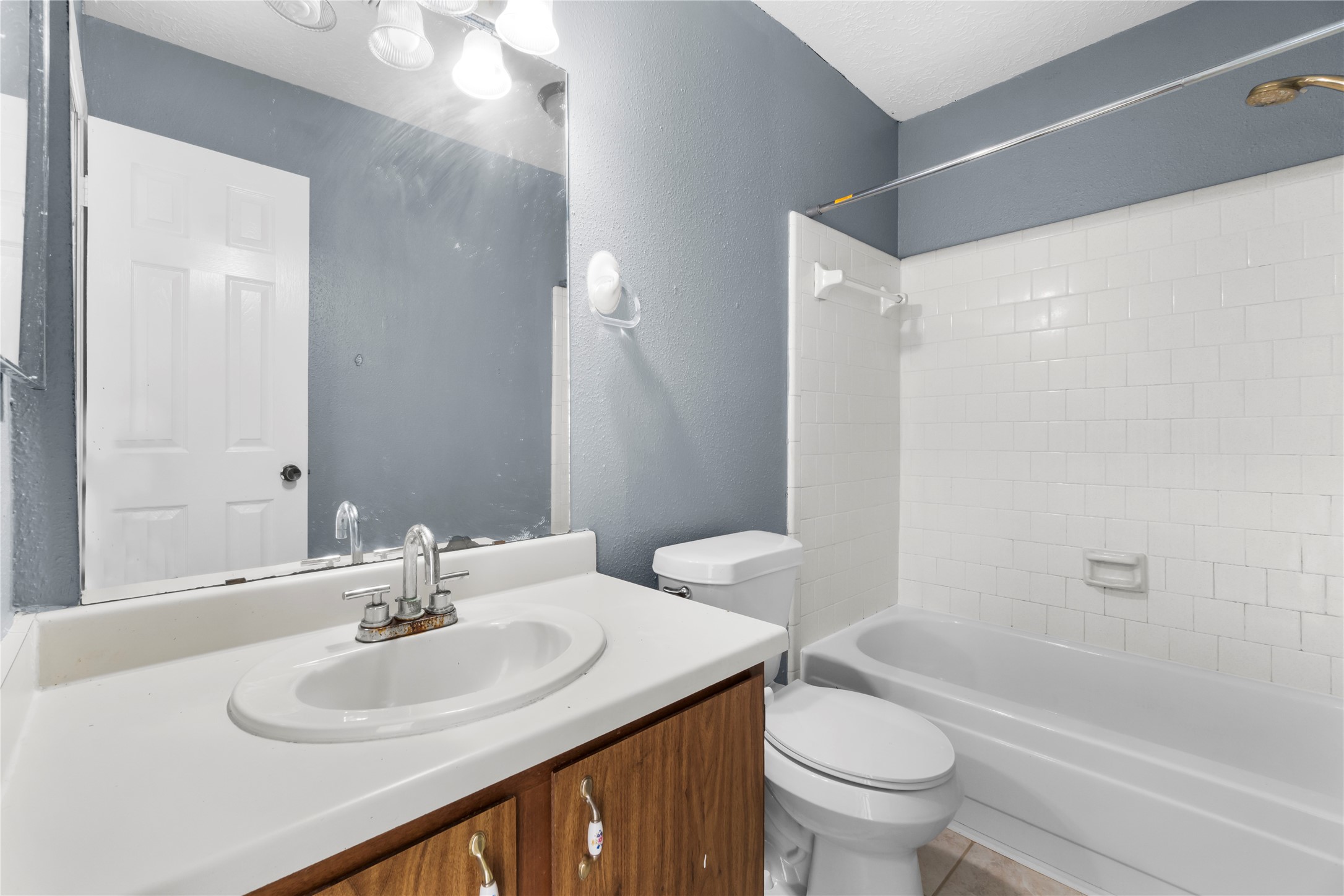 23202 Summergate Drive Spring, TX 77373 - Photo 12 of 16 a bathroom with a sink toilet and shower