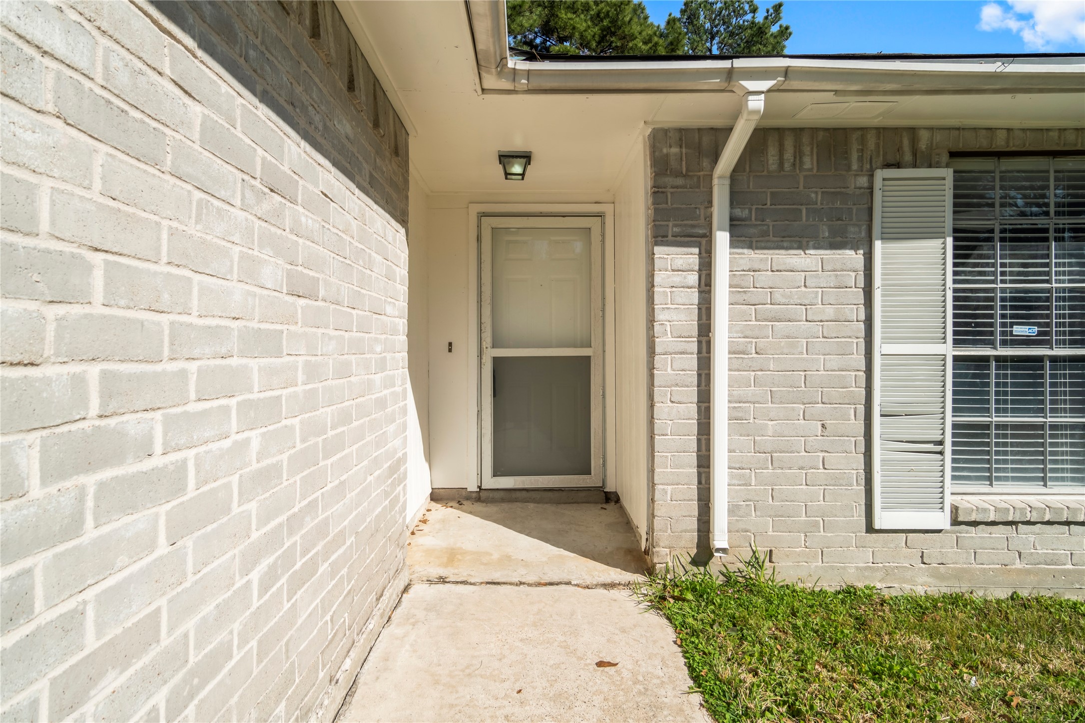 23202 Summergate Drive Spring, TX 77373 - Photo 4 of 16 a view of a brick house with a large window