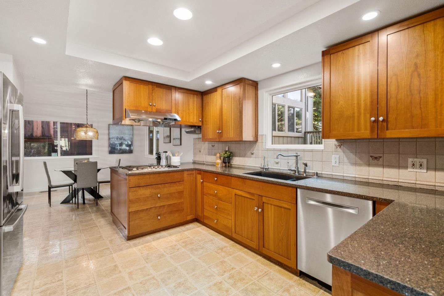 28 Cobblestone Lane Belmont, CA 94002 - Photo 11 of 45 a large kitchen with cabinets
