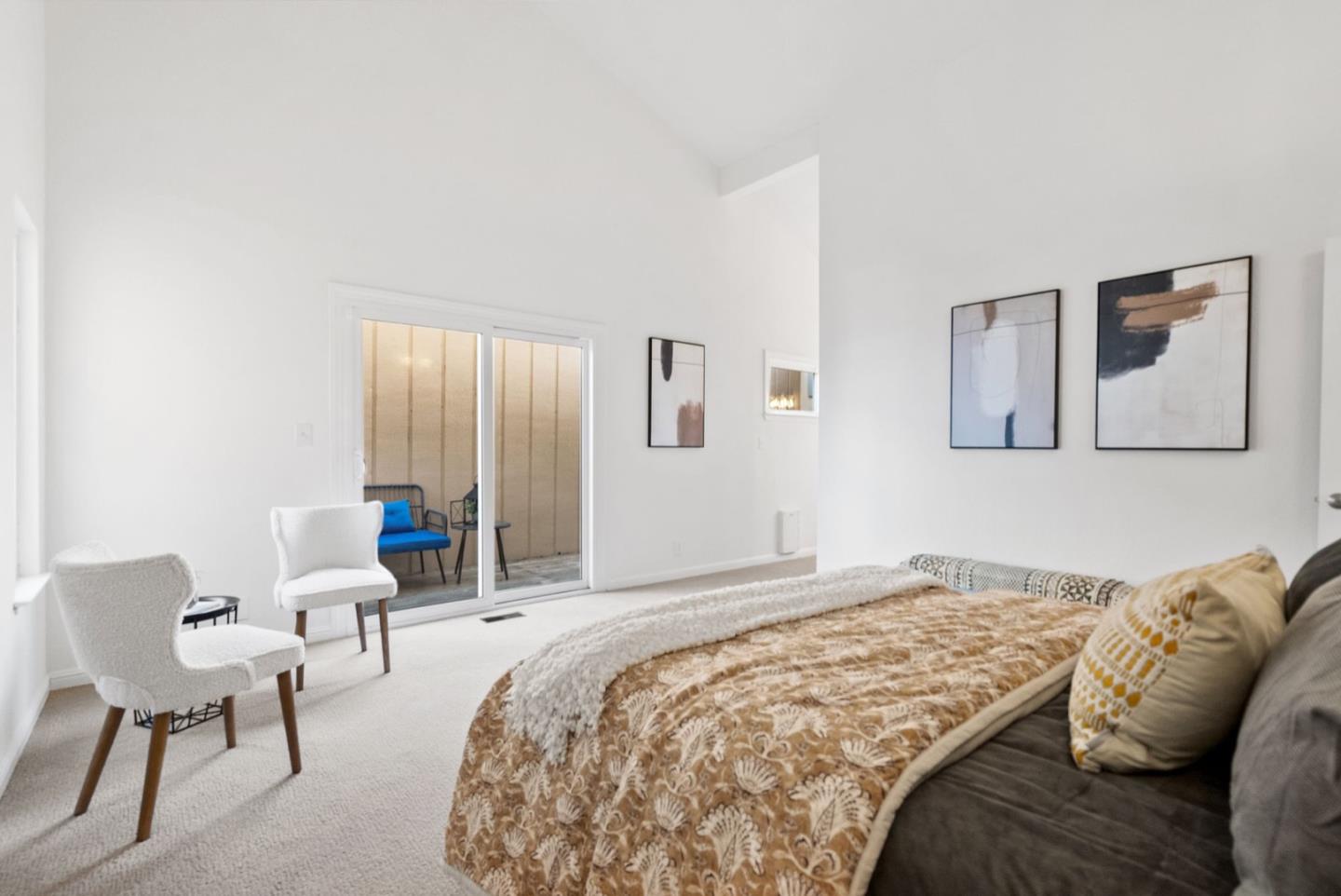 28 Cobblestone Lane Belmont, CA 94002 - Photo 26 of 45 a bedroom with a bed and a chair