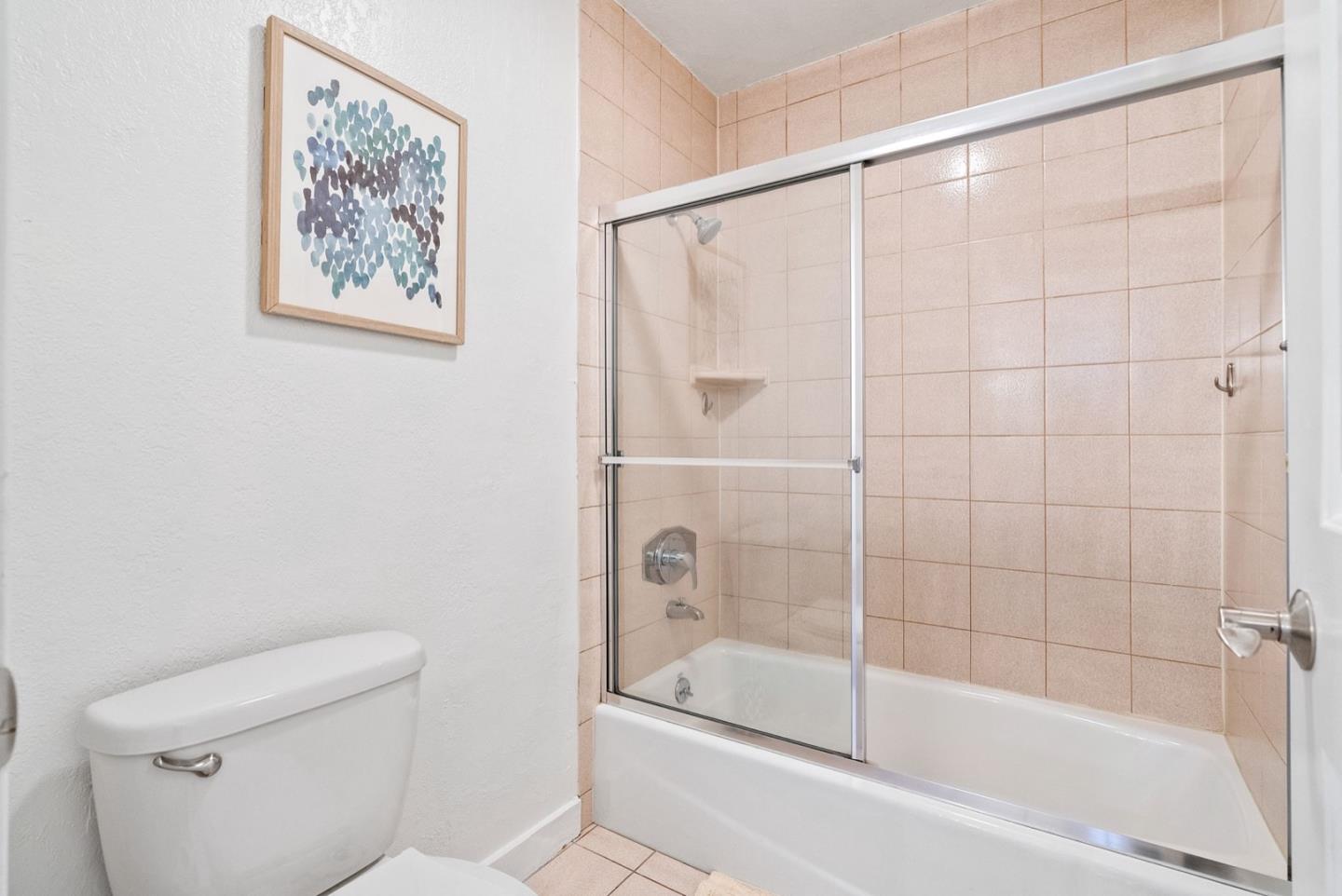 28 Cobblestone Lane Belmont, CA 94002 - Photo 28 of 45 a bathroom with a bathtub and a toilet