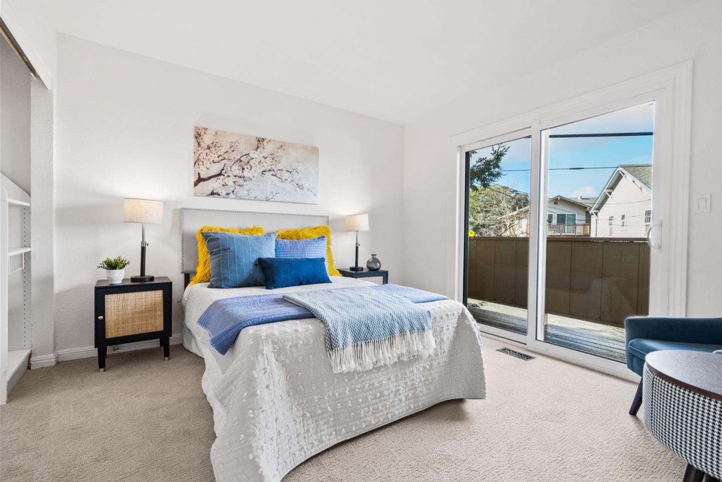 28 Cobblestone Lane Belmont, CA 94002 - Photo 30 of 45 a bedroom with a bed a table and painting