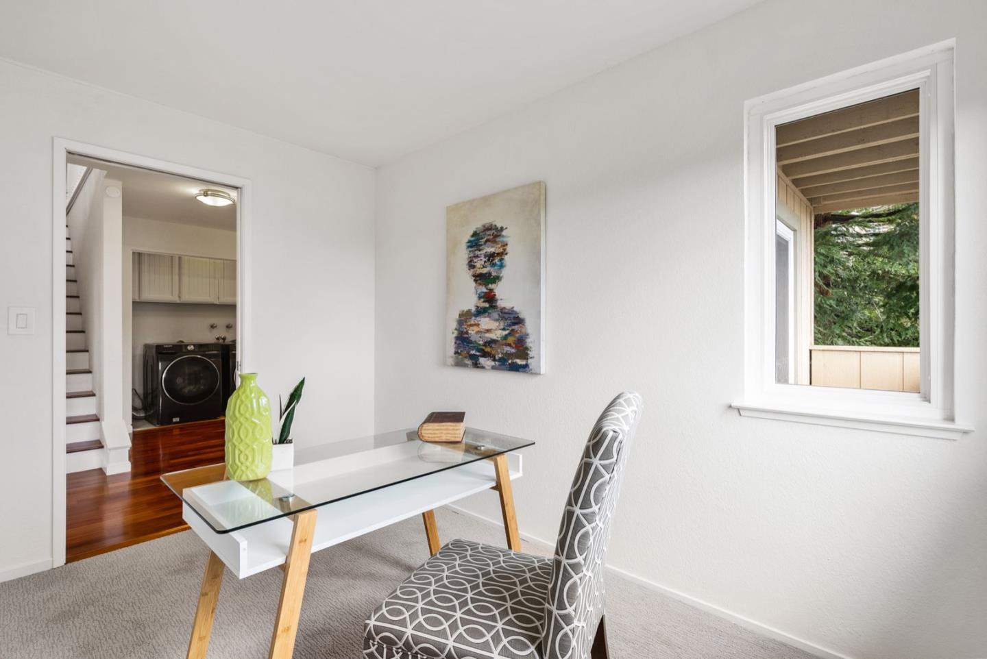 28 Cobblestone Lane Belmont, CA 94002 - Photo 35 of 45 a view of a workspace with furniture and a window