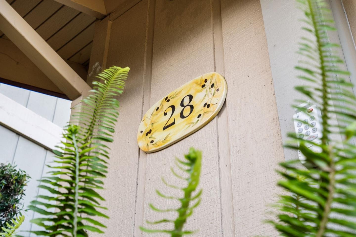 28 Cobblestone Lane Belmont, CA 94002 - Photo 4 of 45 a close up of a sign