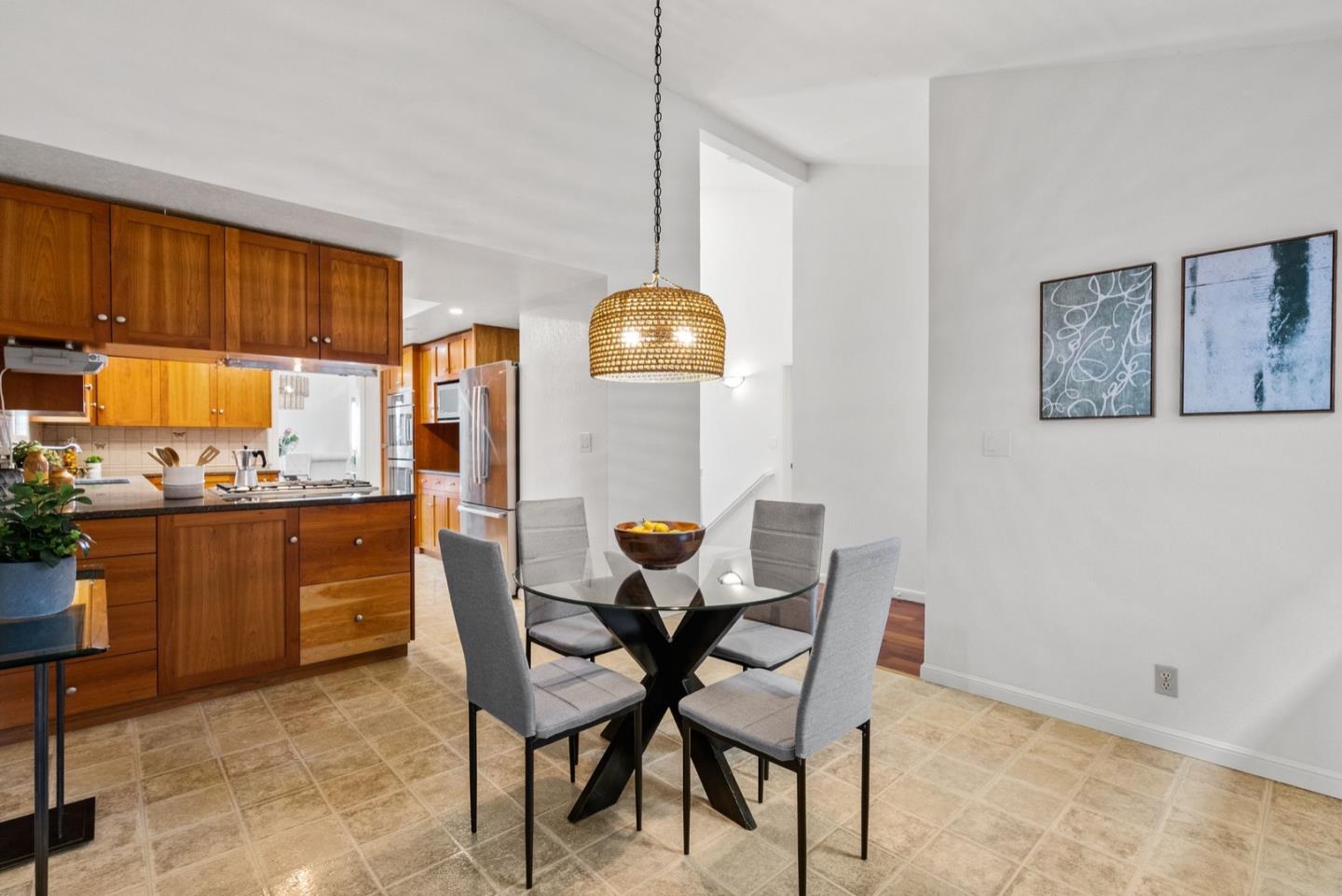28 Cobblestone Lane Belmont, CA 94002 - Photo 9 of 45 a dining room with furniture and chandelier