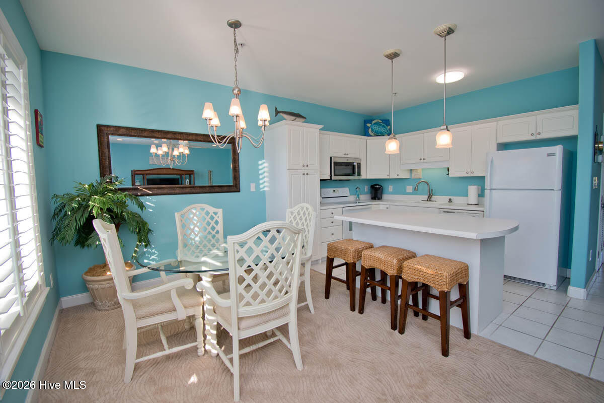 1700 Salter Path Road, Unit K102 Indian Beach, NC 28512 - Photo 12 of 45 Dining to Kitchen