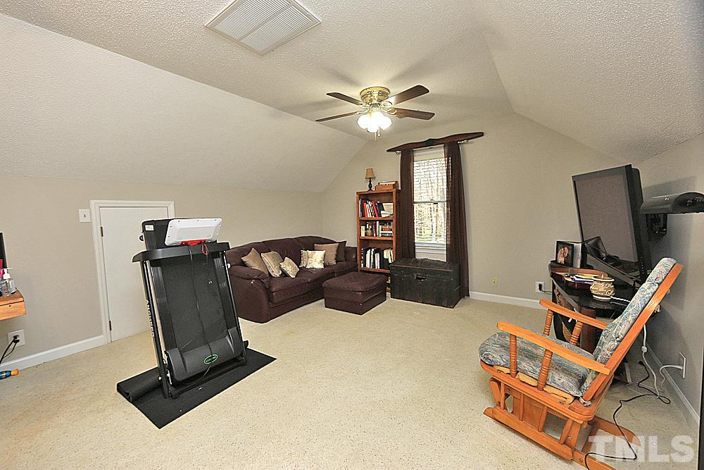 7210 Kemp Road Raleigh, NC 27613 - Photo 14 of 20 a room with chairs closet and a window
