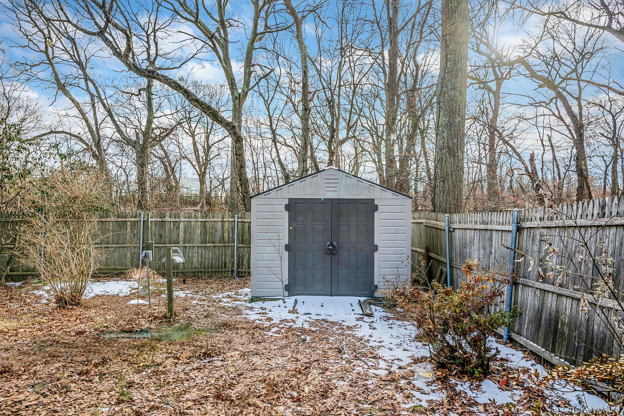 120 Rustic Road Port Jefferson, NY 11777 - Photo 11 of 45 View of shed featuring a fenced backyard