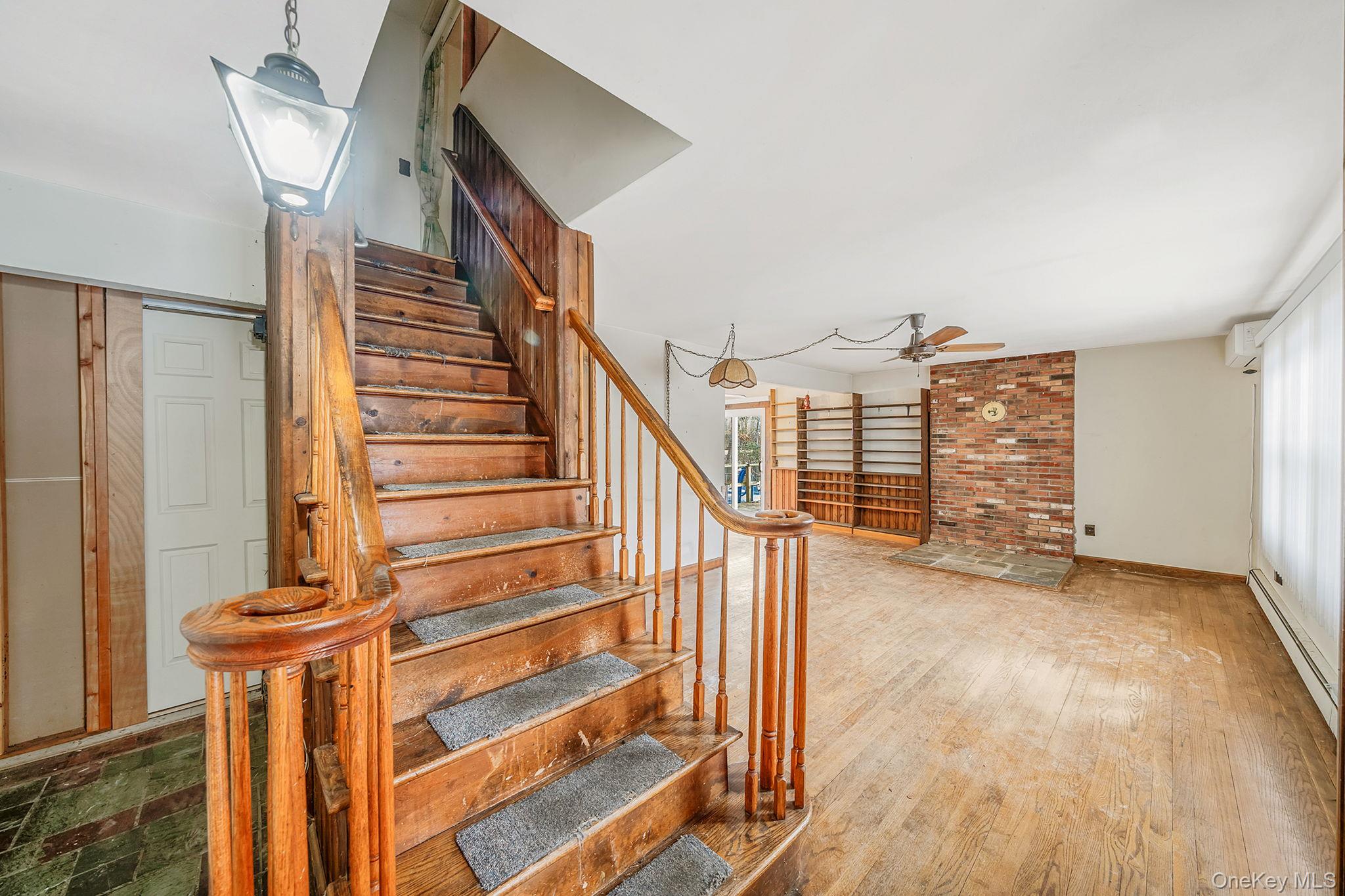 120 Rustic Road Port Jefferson, NY 11777 - Photo 12 of 45 a view of entryway and hall with wooden floor
