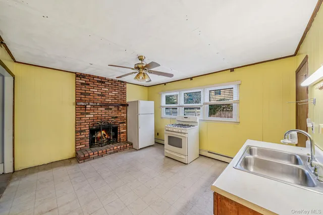 a view of a bedroom with a sink and dishwasher