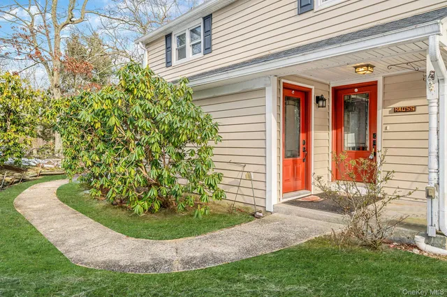 a view of a backyard with potted plants
