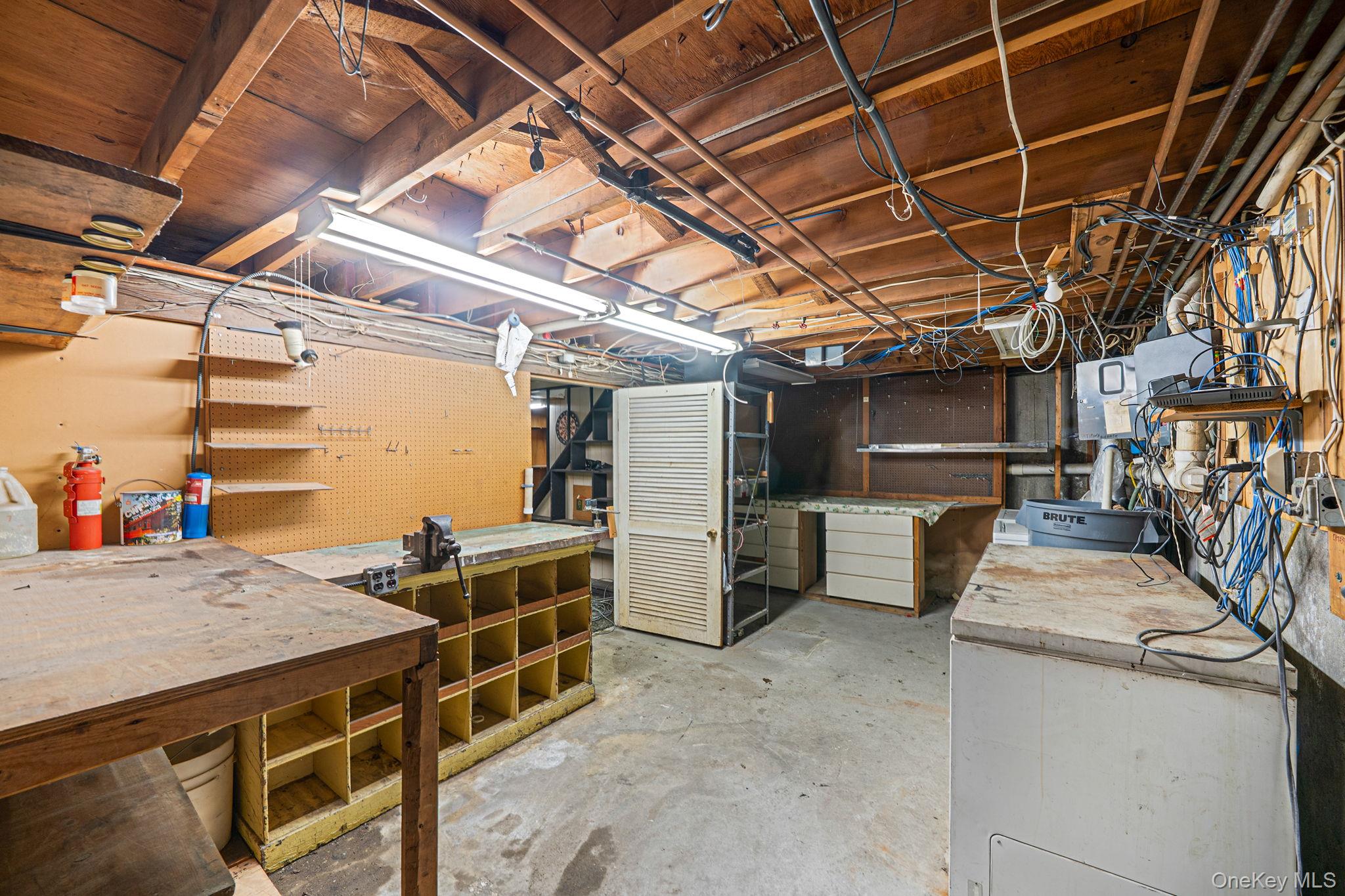 120 Rustic Road Port Jefferson, NY 11777 - Photo 44 of 45 Unfinished below grade area with a workshop area