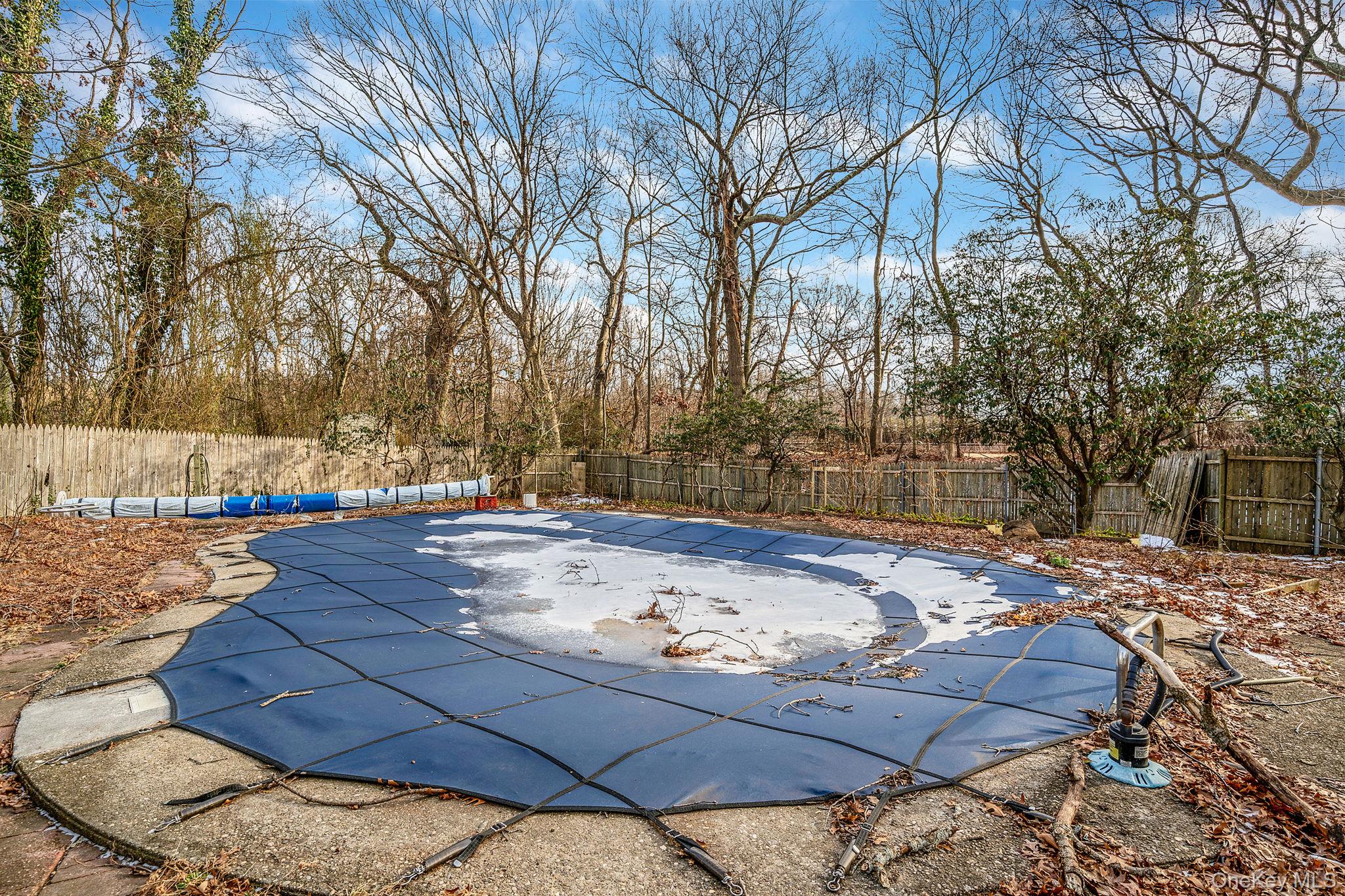 120 Rustic Road Port Jefferson, NY 11777 - Photo 10 of 45 View of pool featuring a fenced backyard and a patio
