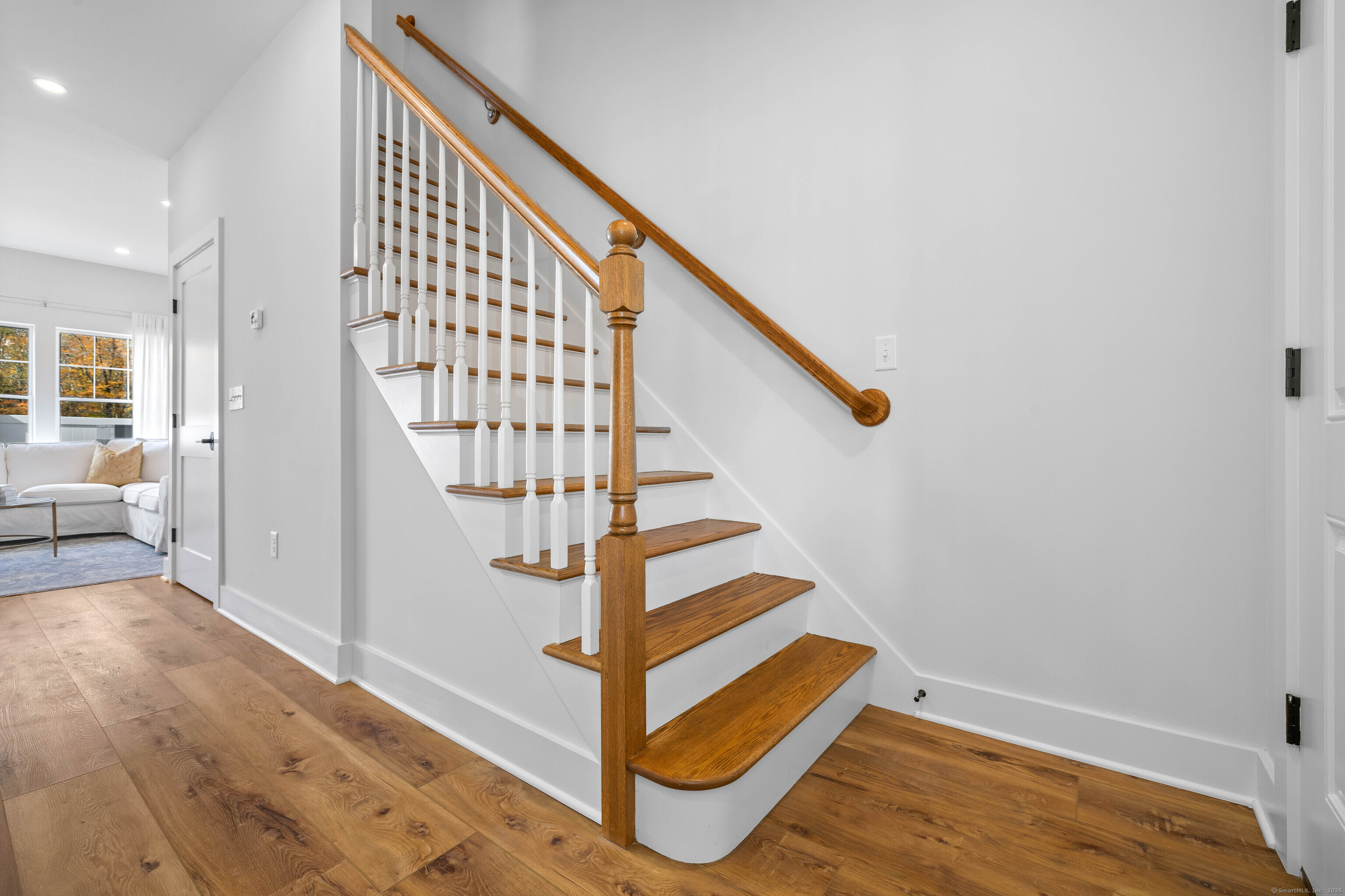 138 Boston Post Road, Unit 16 East Lyme, CT 06333 - Photo 17 of 35 a view of entryway and hall with wooden floor