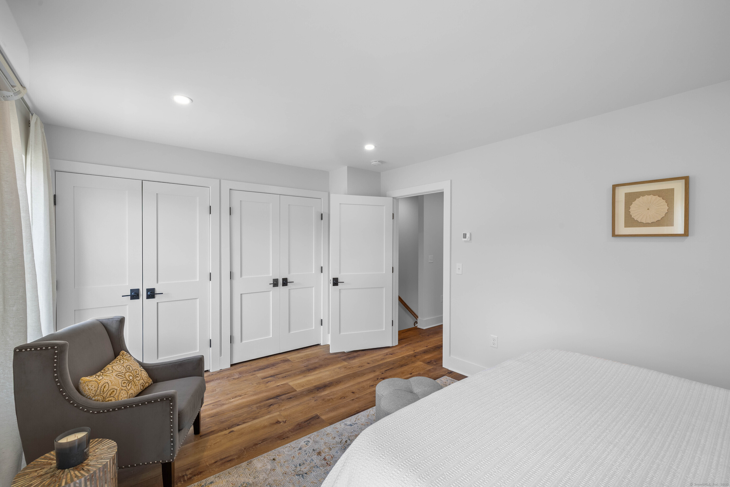 138 Boston Post Road, Unit 16 East Lyme, CT 06333 - Photo 20 of 35 a bedroom with a bed and furniture