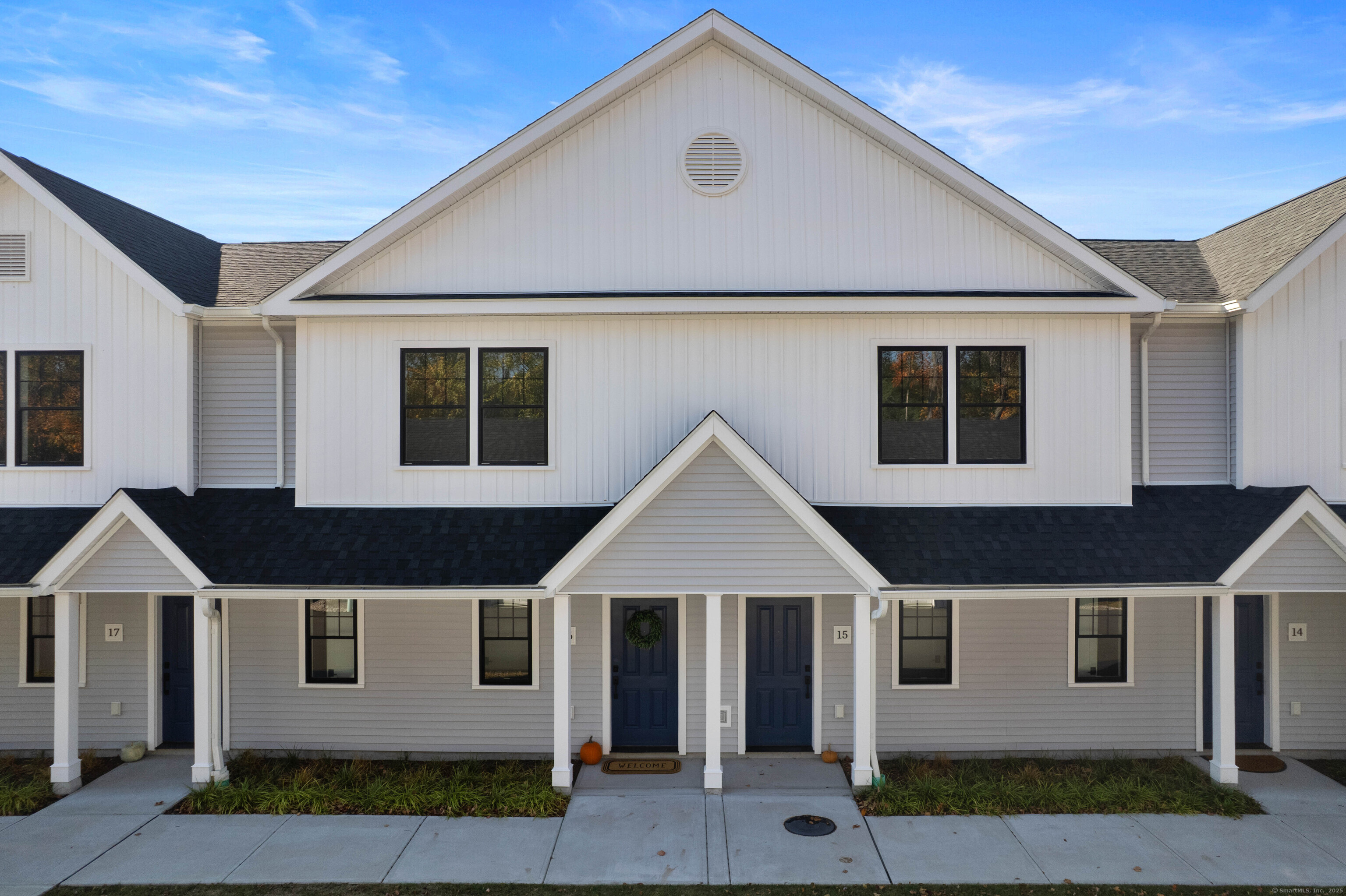 138 Boston Post Road, Unit 16 East Lyme, CT 06333 - Photo 29 of 35 a front view of a house with windows