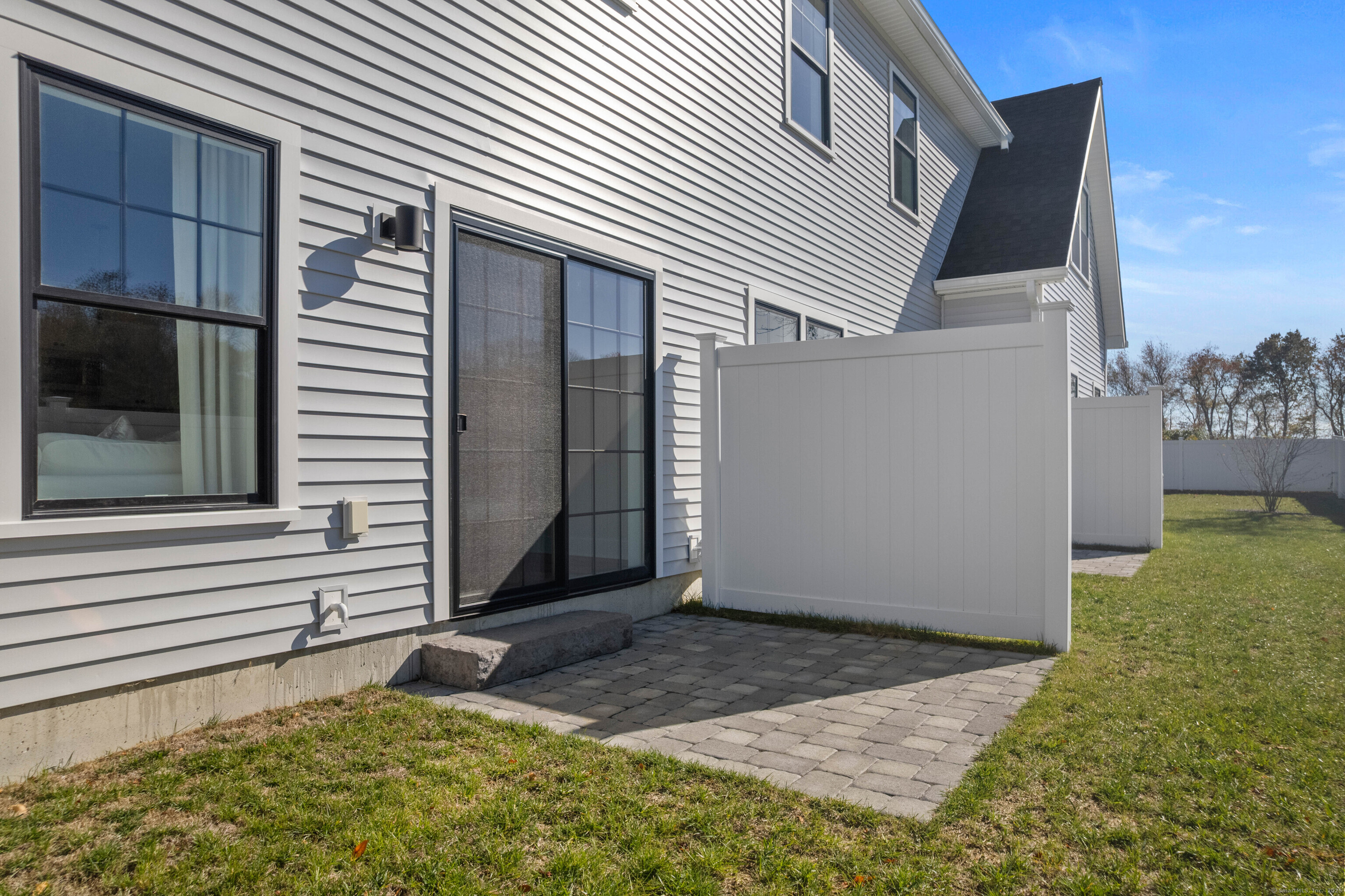 138 Boston Post Road, Unit 16 East Lyme, CT 06333 - Photo 31 of 35 a view of a house with backyard