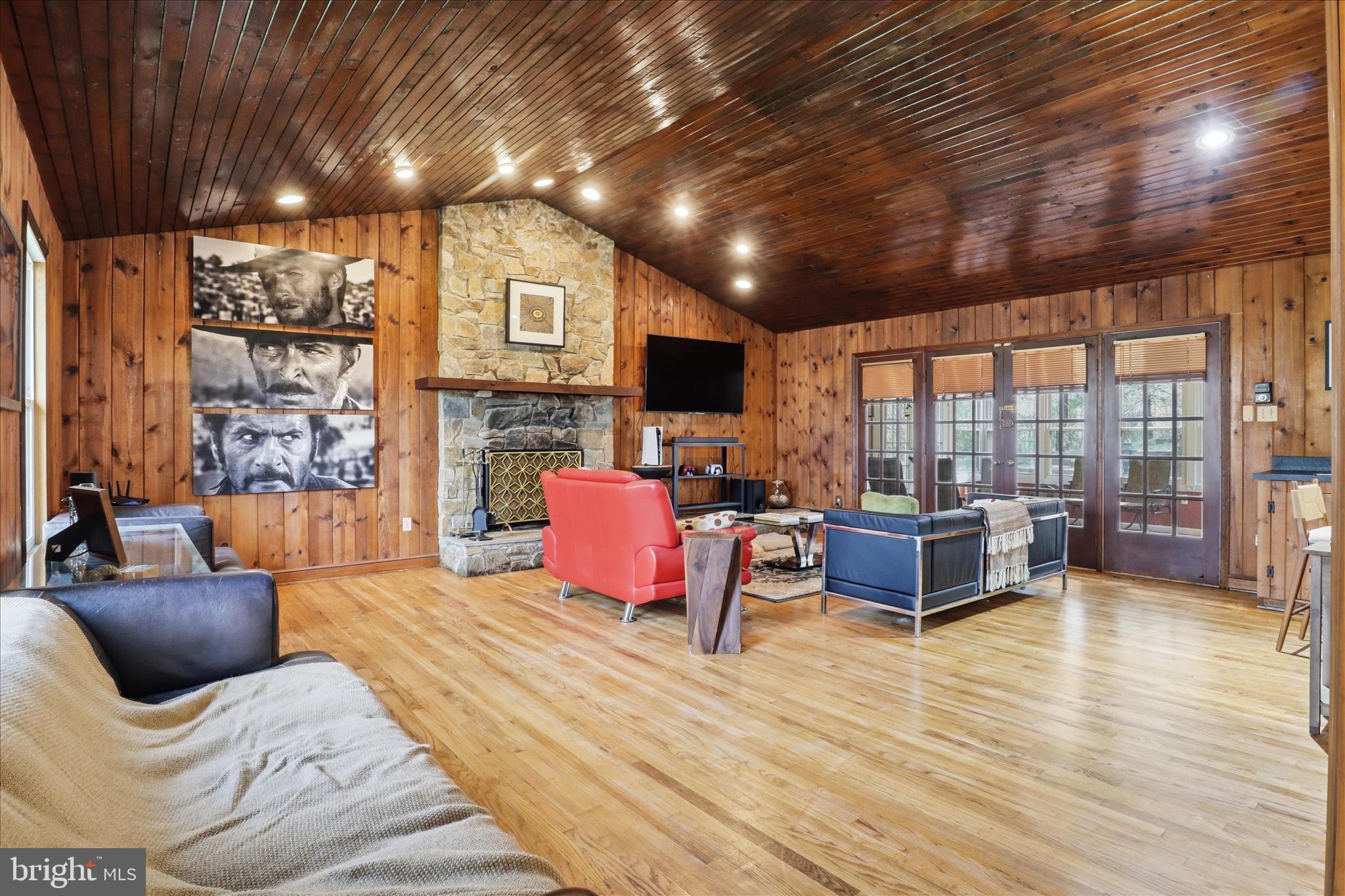7501 Evans Ford Road Clifton, VA 20124 - Photo 12 of 74 Family room with vaulted ceilings and fireplace