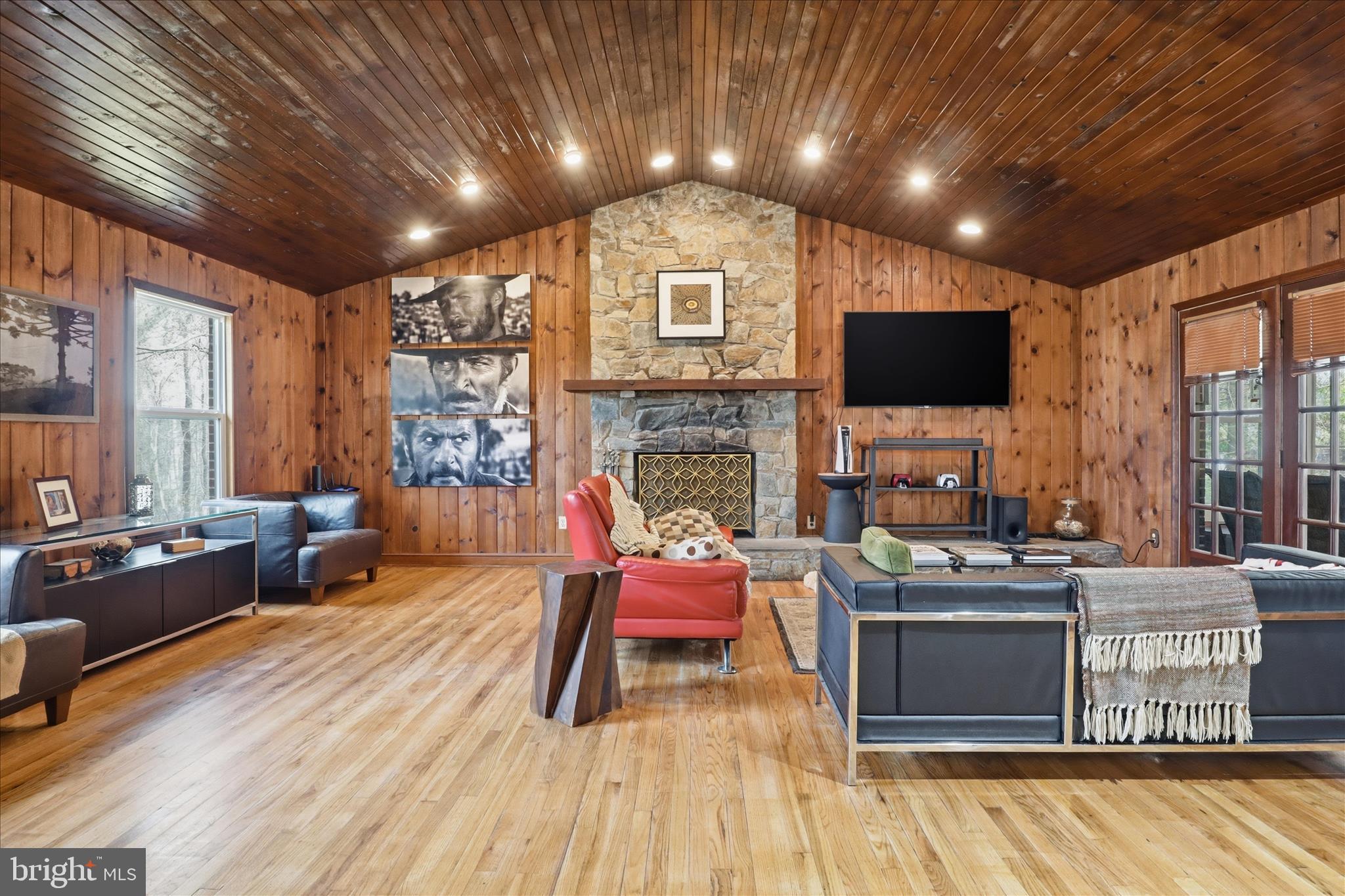7501 Evans Ford Road Clifton, VA 20124 - Photo 13 of 74 Family room with vaulted ceilings and fireplace