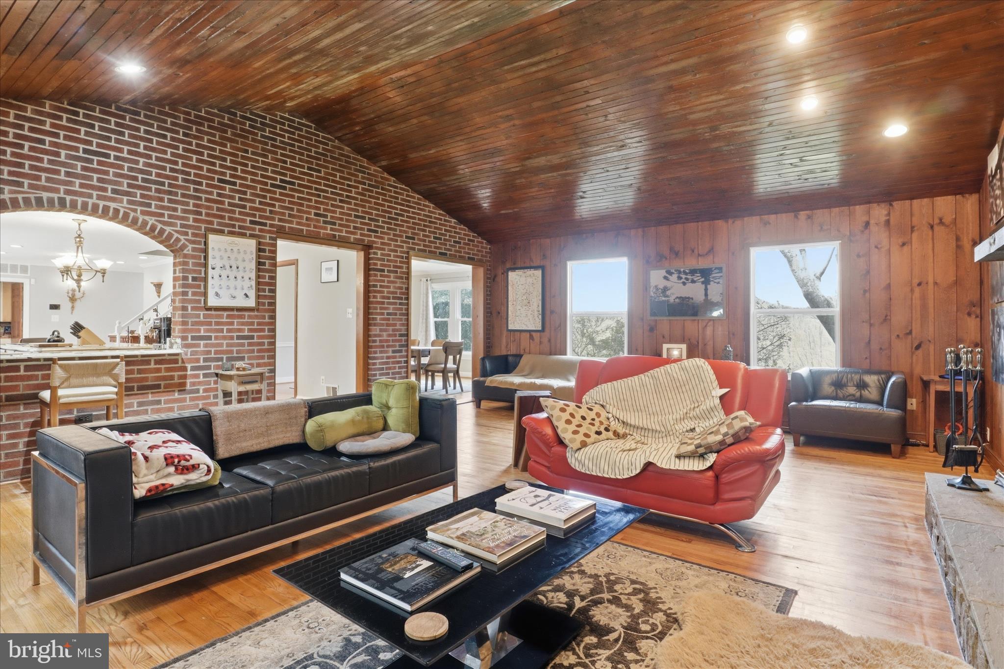 7501 Evans Ford Road Clifton, VA 20124 - Photo 14 of 74 Family room with vaulted ceilings and fireplace