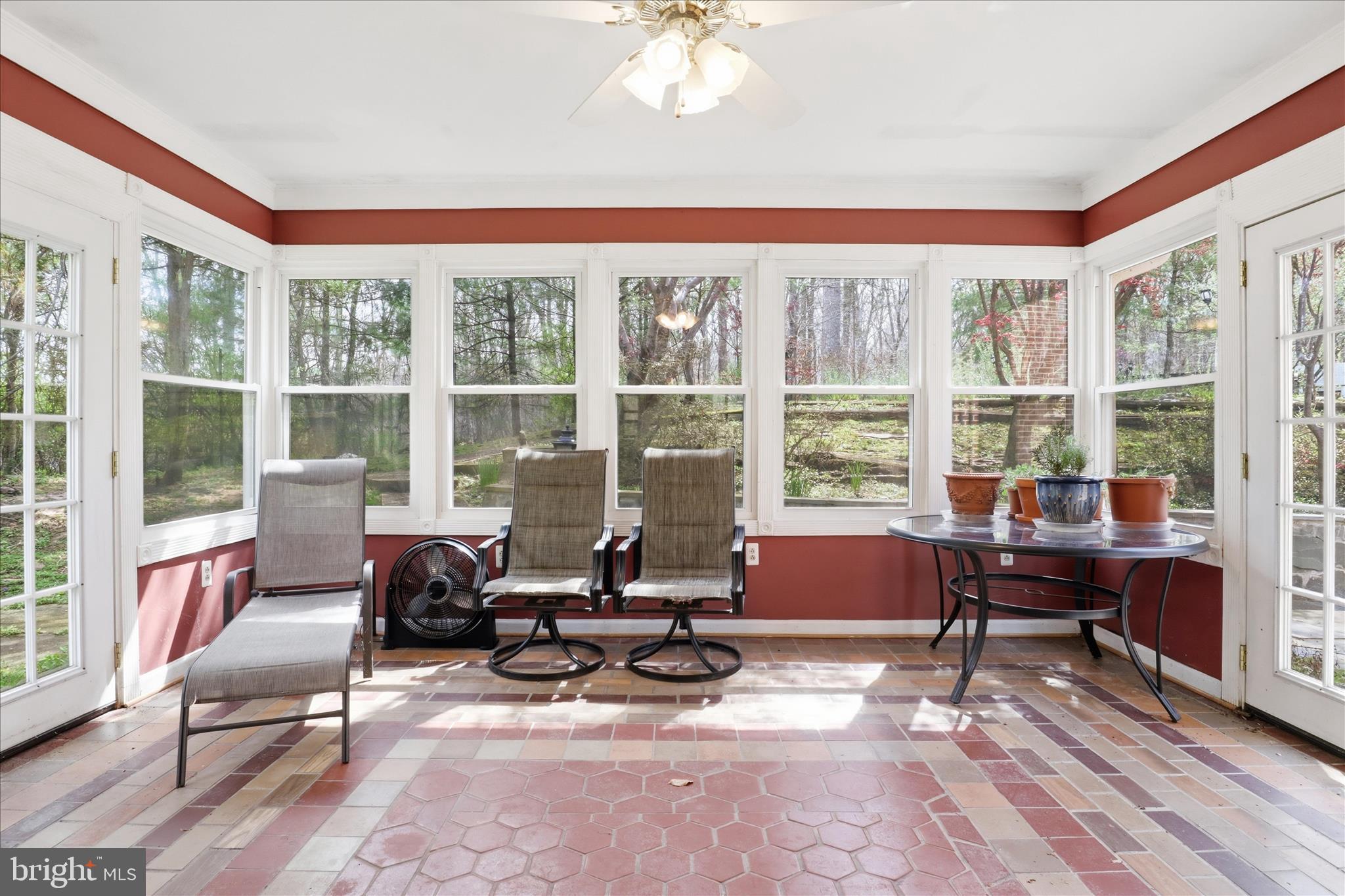 7501 Evans Ford Road Clifton, VA 20124 - Photo 16 of 74 Bright sunroom filled with natural light and backy