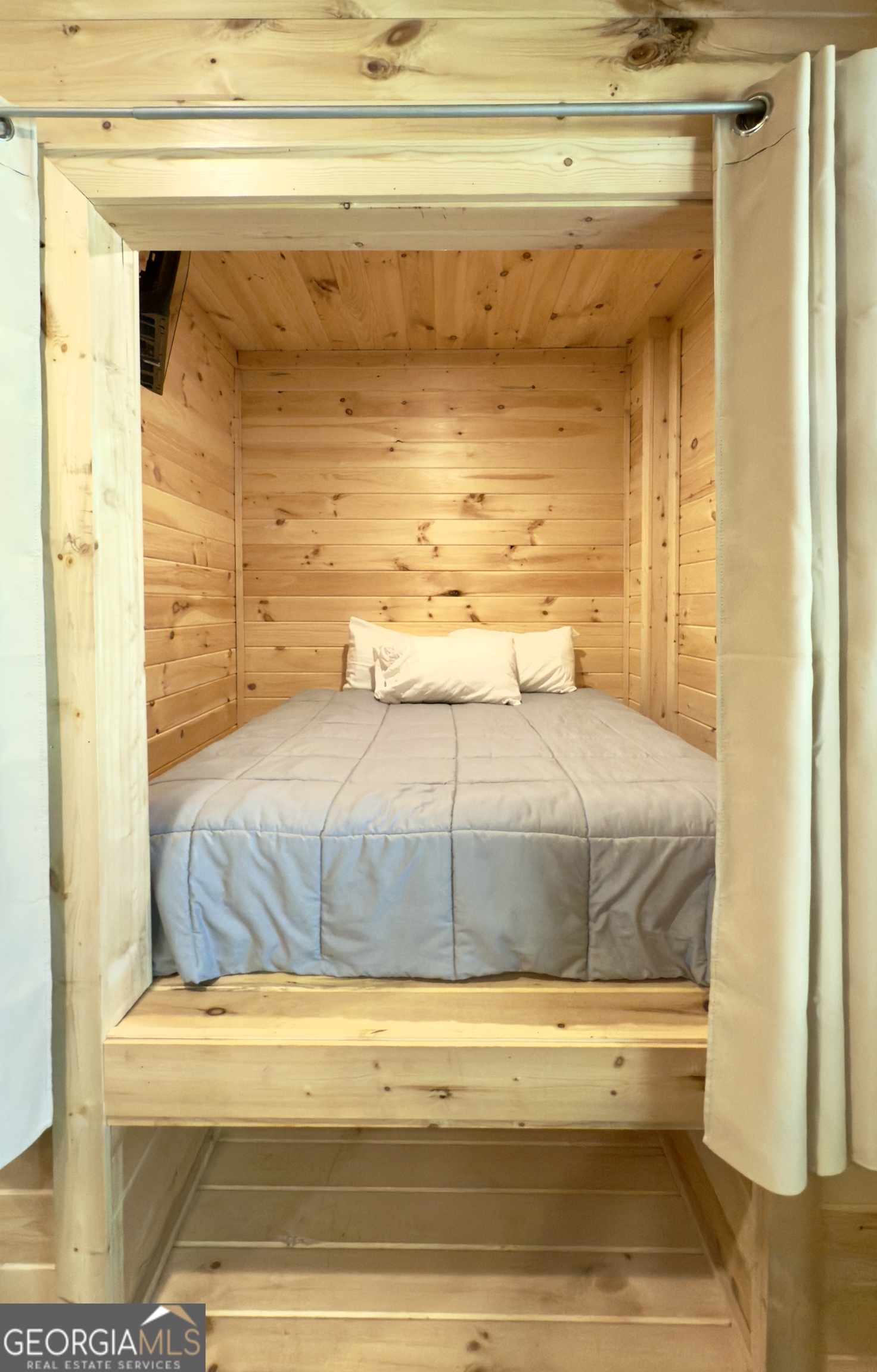 469 Vista View Place Cleveland, GA 30528 - Photo 23 of 39 a bedroom with a bed and walk in closet