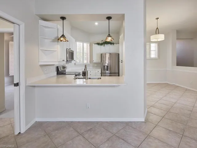 $695,000 | 1033 Egrets Walk Circle, Unit 203, Naples, FL 34108