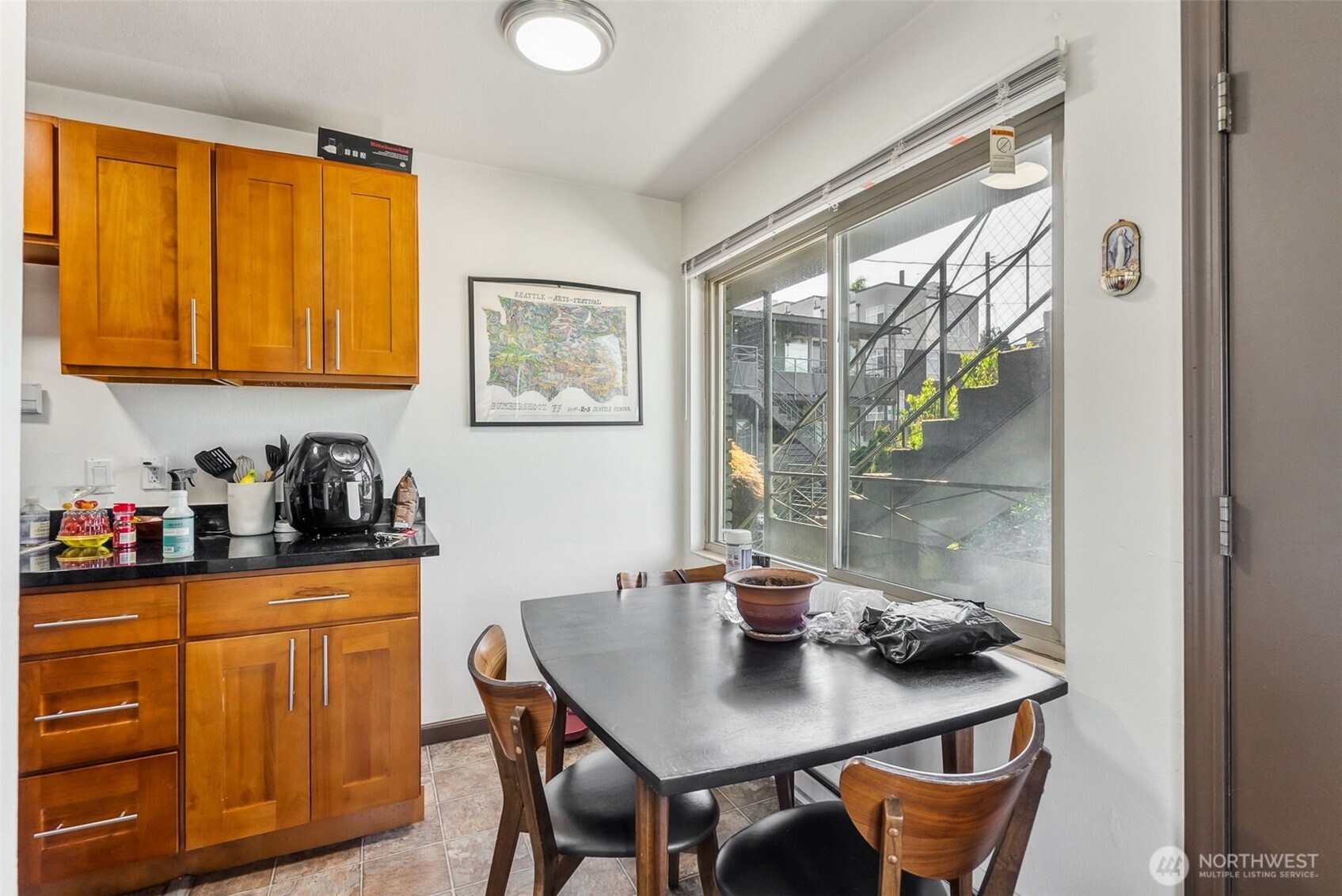 2350 Beacon Avenue South Seattle, WA 98144 - Photo 13 of 23 a kitchen with a table and chairs in it