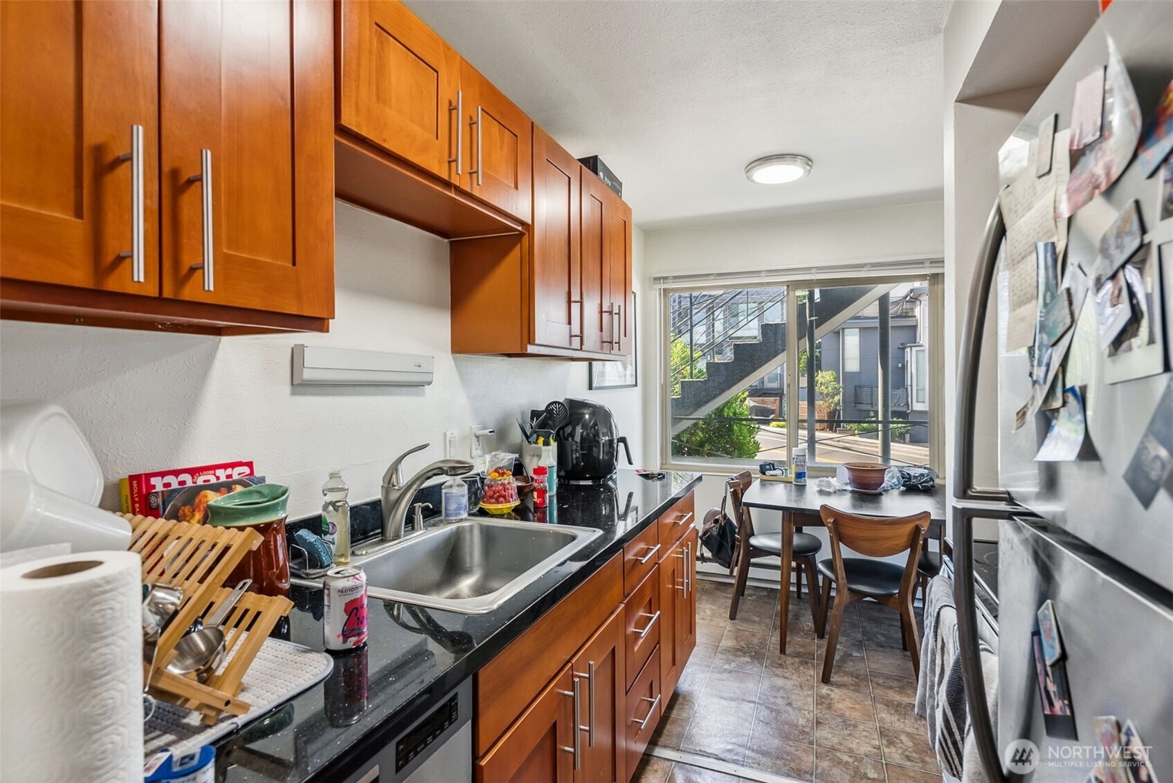 2350 Beacon Avenue South Seattle, WA 98144 - Photo 15 of 23 a kitchen with a stove a sink and cabinets
