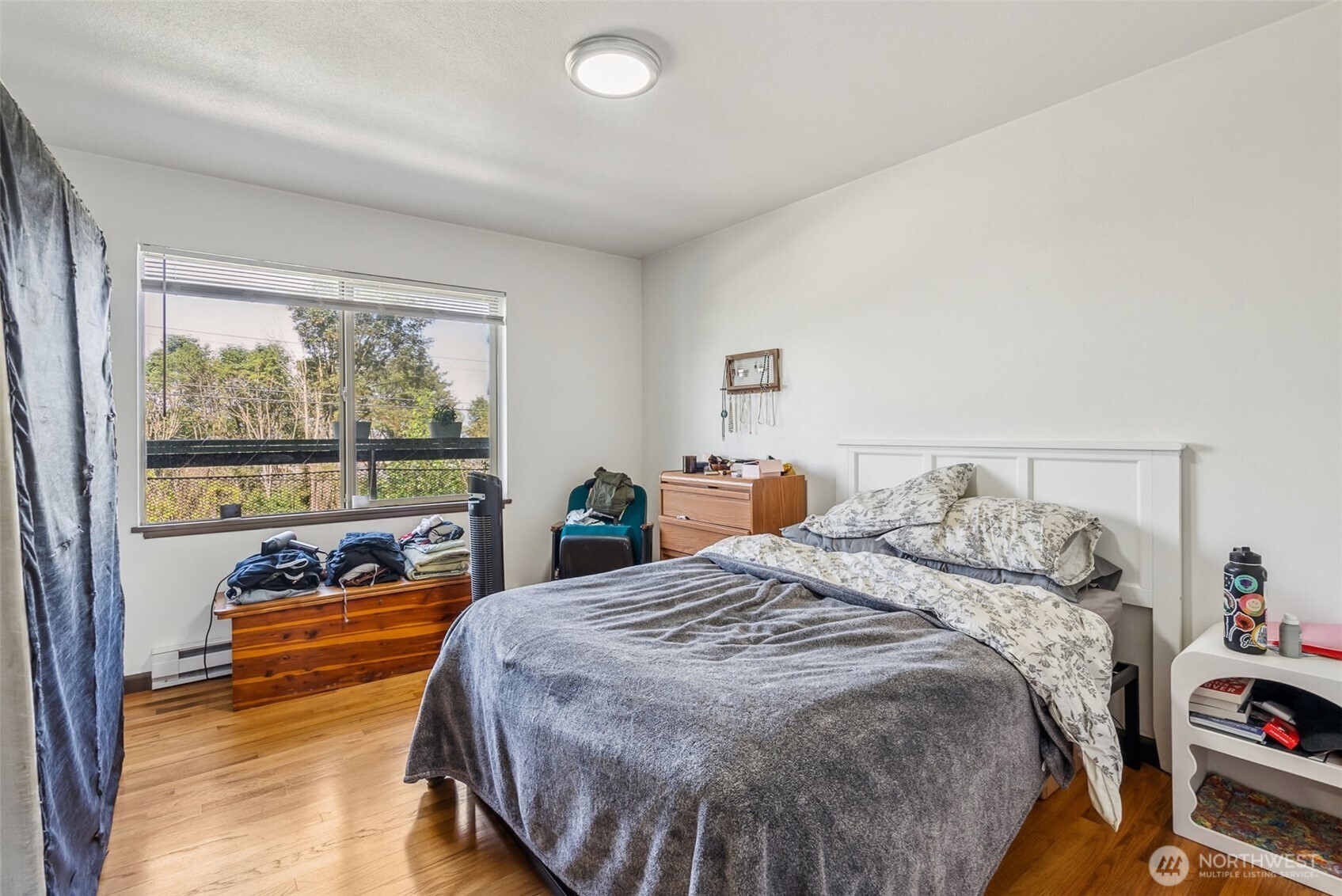 2350 Beacon Avenue South Seattle, WA 98144 - Photo 17 of 23 a bedroom with a bed and window