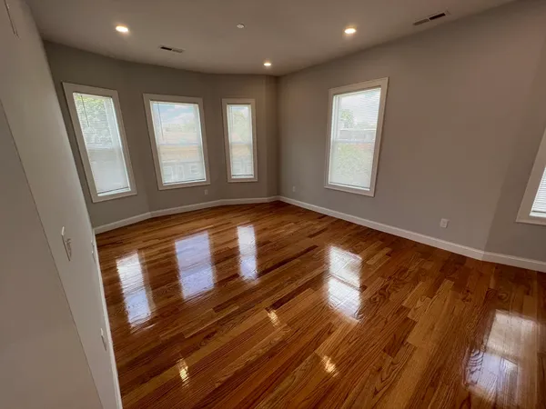 a view of entryway with wooden floor