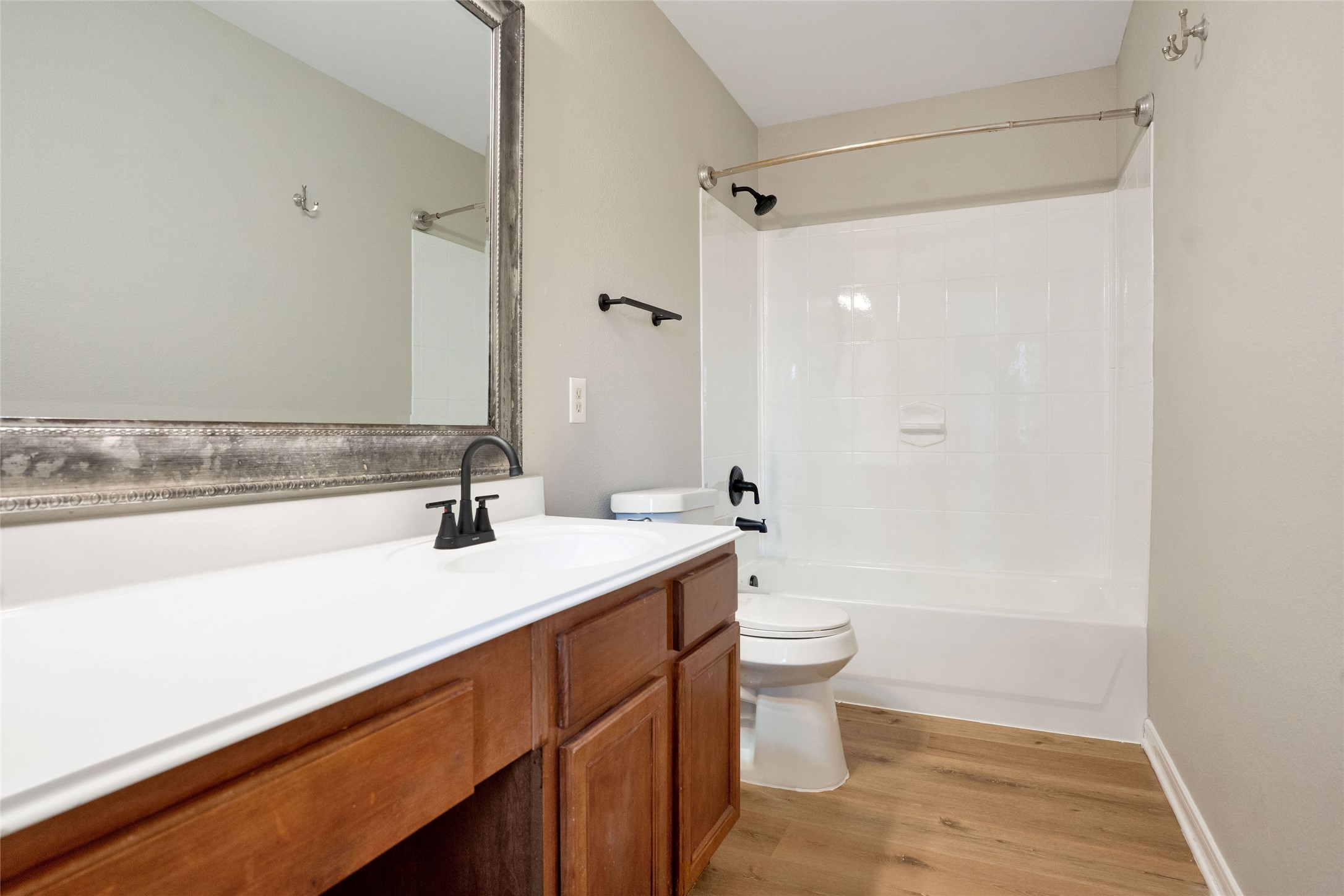 3630 Avalon Castle Drive Spring, TX 77386 - Photo 24 of 39 a bathroom with a sink a toilet a shower and a mirror