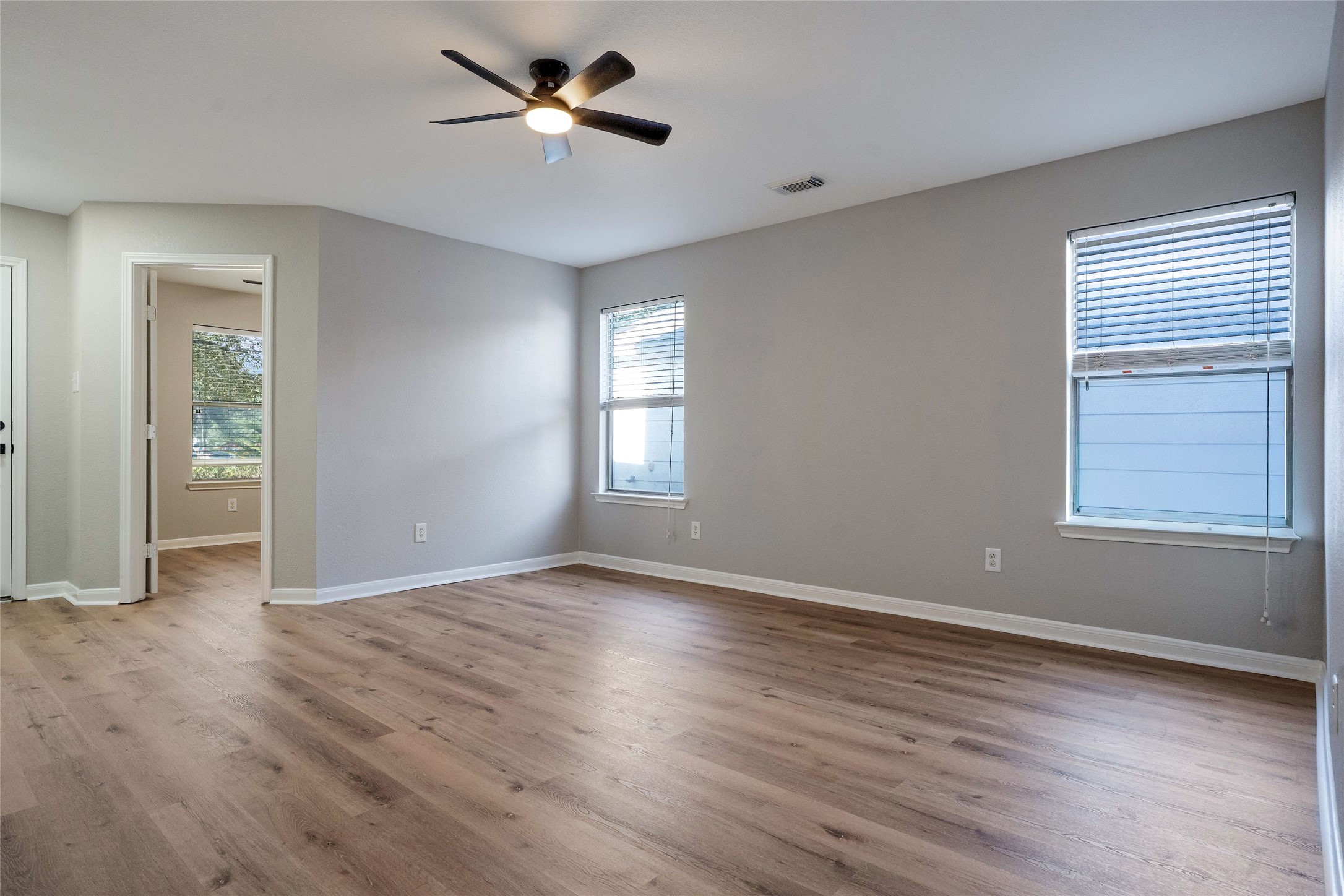 3630 Avalon Castle Drive Spring, TX 77386 - Photo 5 of 39 a view of empty room with wooden floor and fan