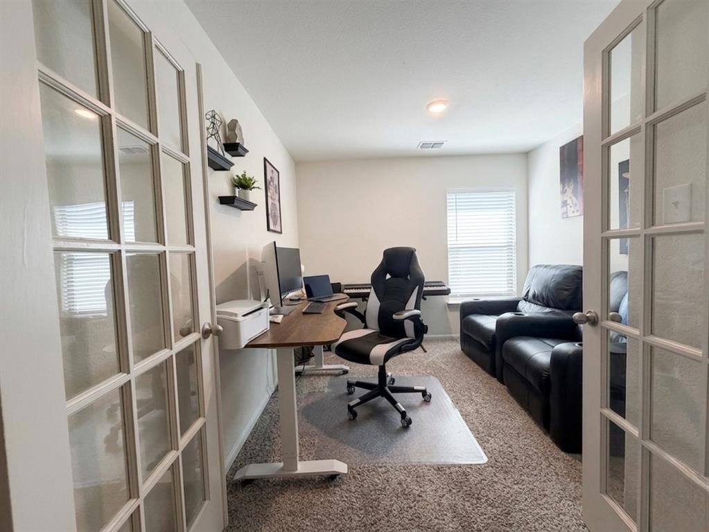 13604 Mineral Road Ponder, TX 76259 - Photo 11 of 20 Office area featuring french doors and light carpet