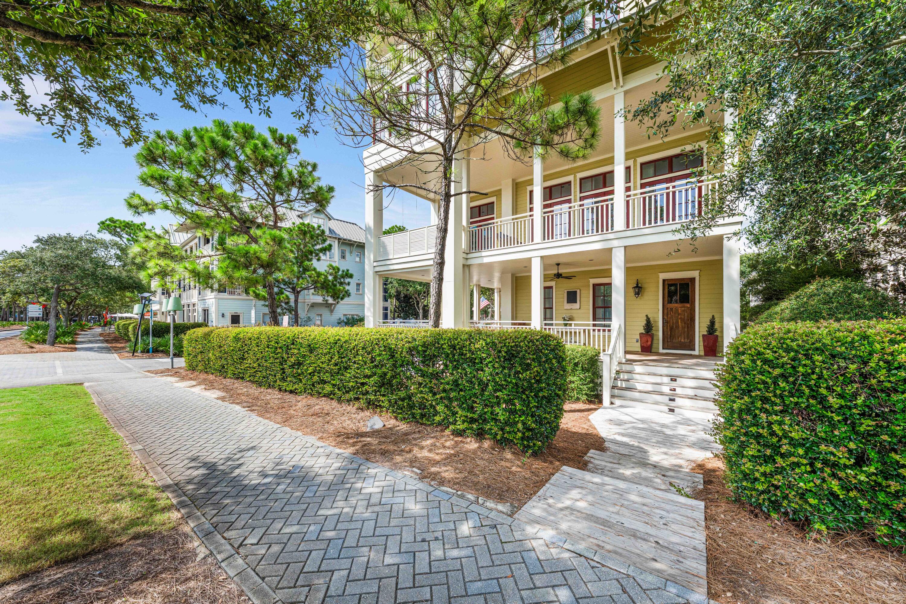 81 Western Lake Drive Santa Rosa Beach, FL 32459 - Photo 13 of 89 a view of a building with a garden